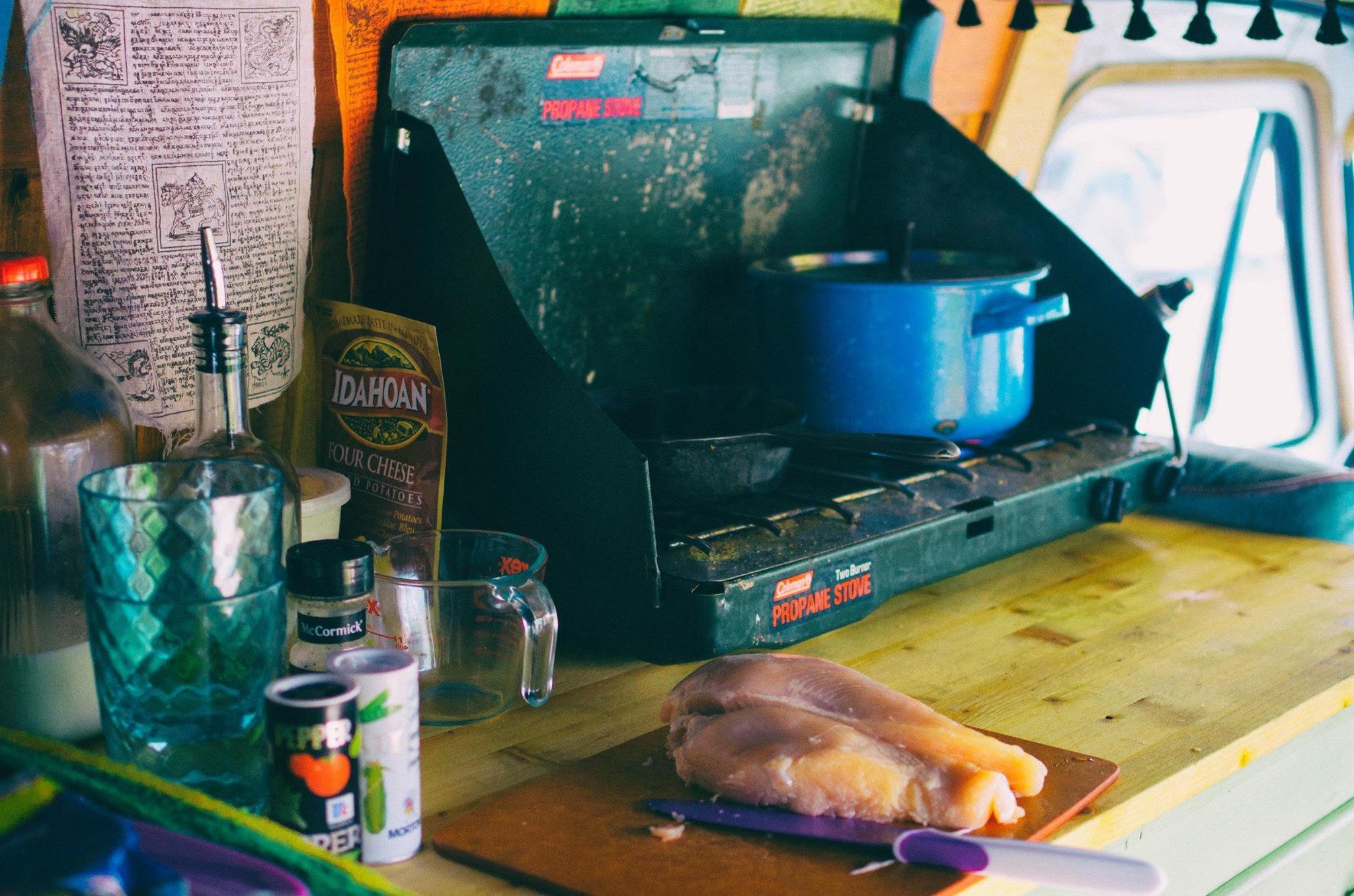 The van's rudimentary kitchen set-up (Instagram/@optimistphoto)