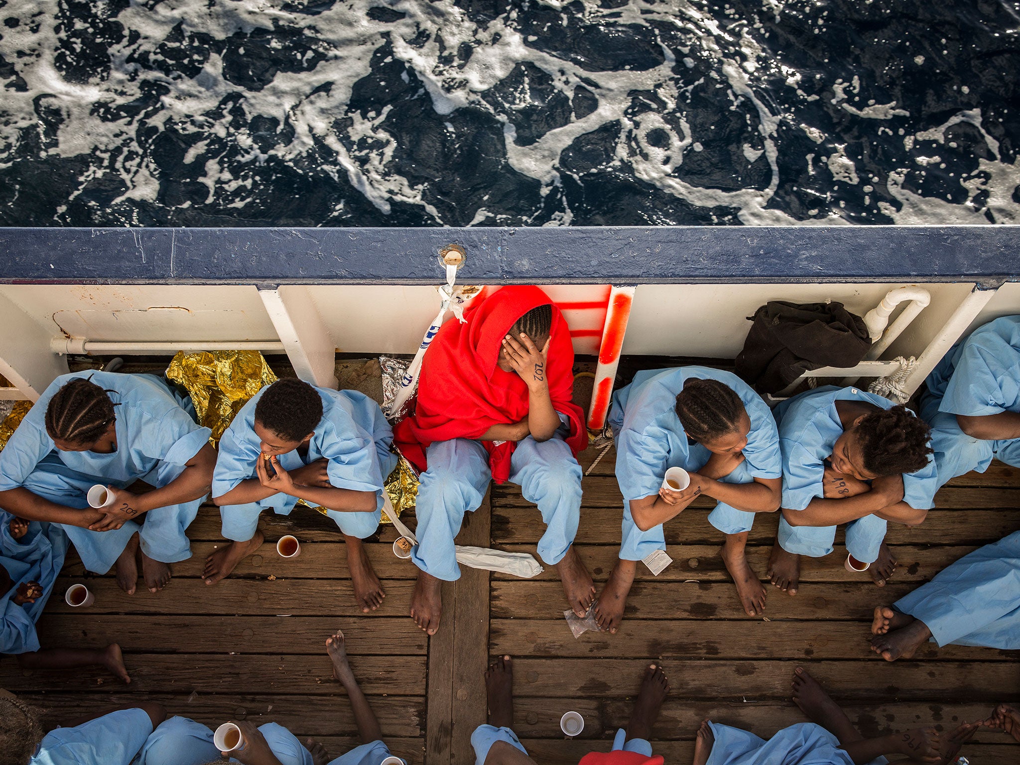 Women on the Golfo Azzurro rescue vessel after being rescued