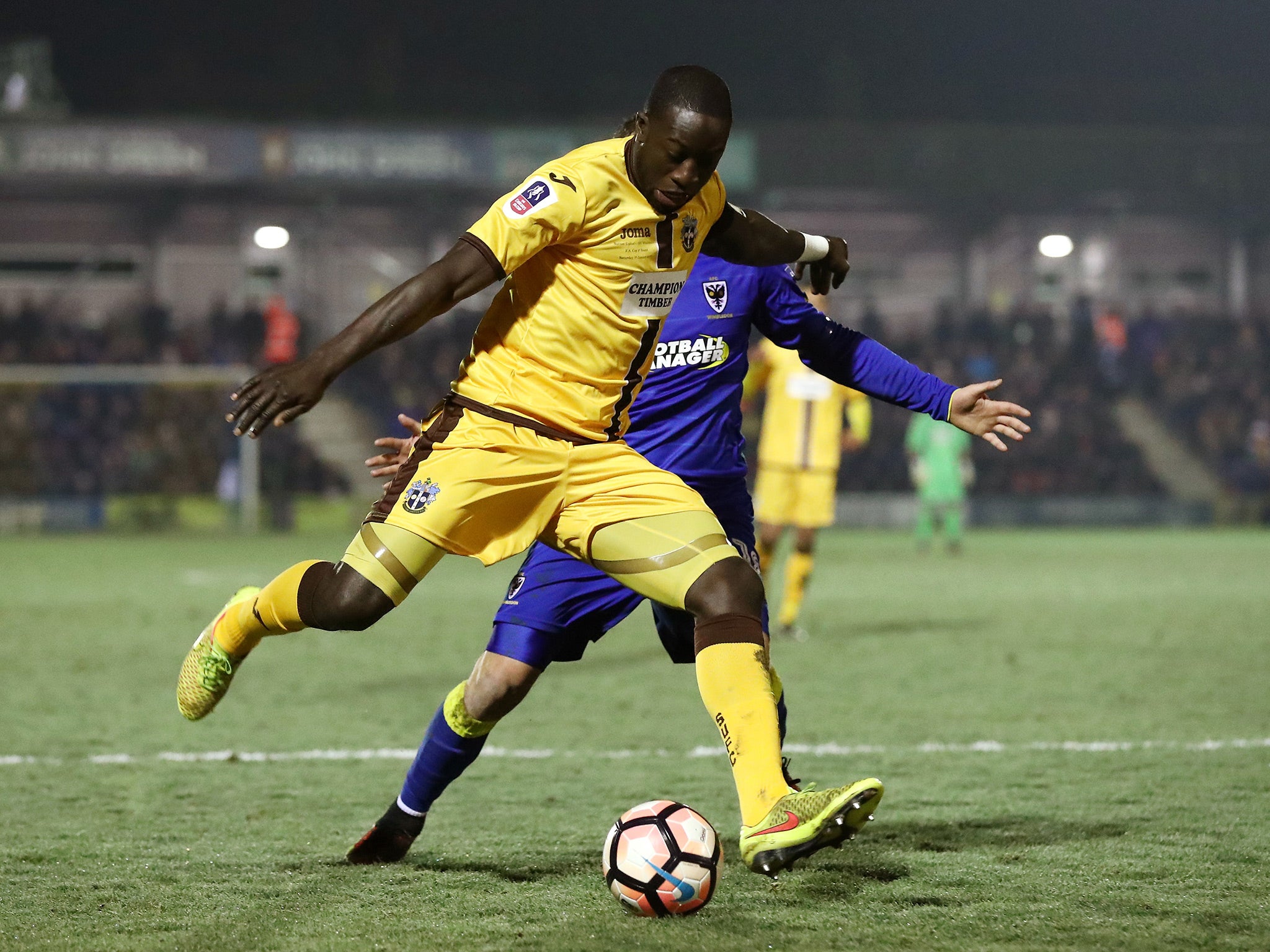 Roarie Deacon scored Sutton's equaliser to set up a grandstand finish