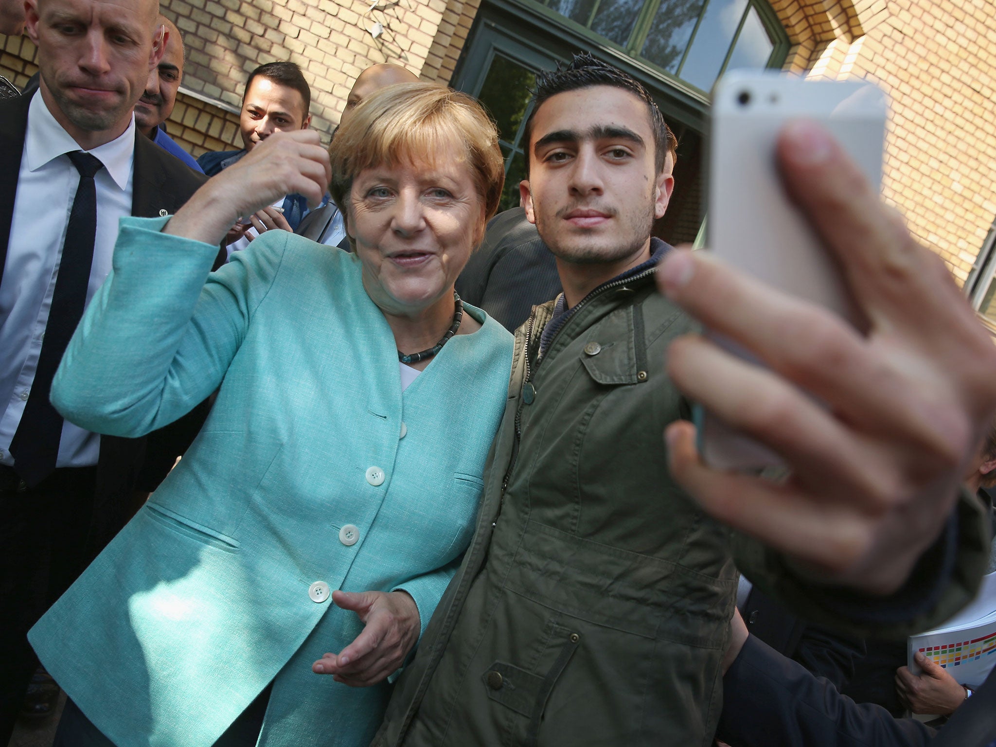 A photo of Anas Modamani taking a selfie with Angela Merkel went viral after it was used by news organisations