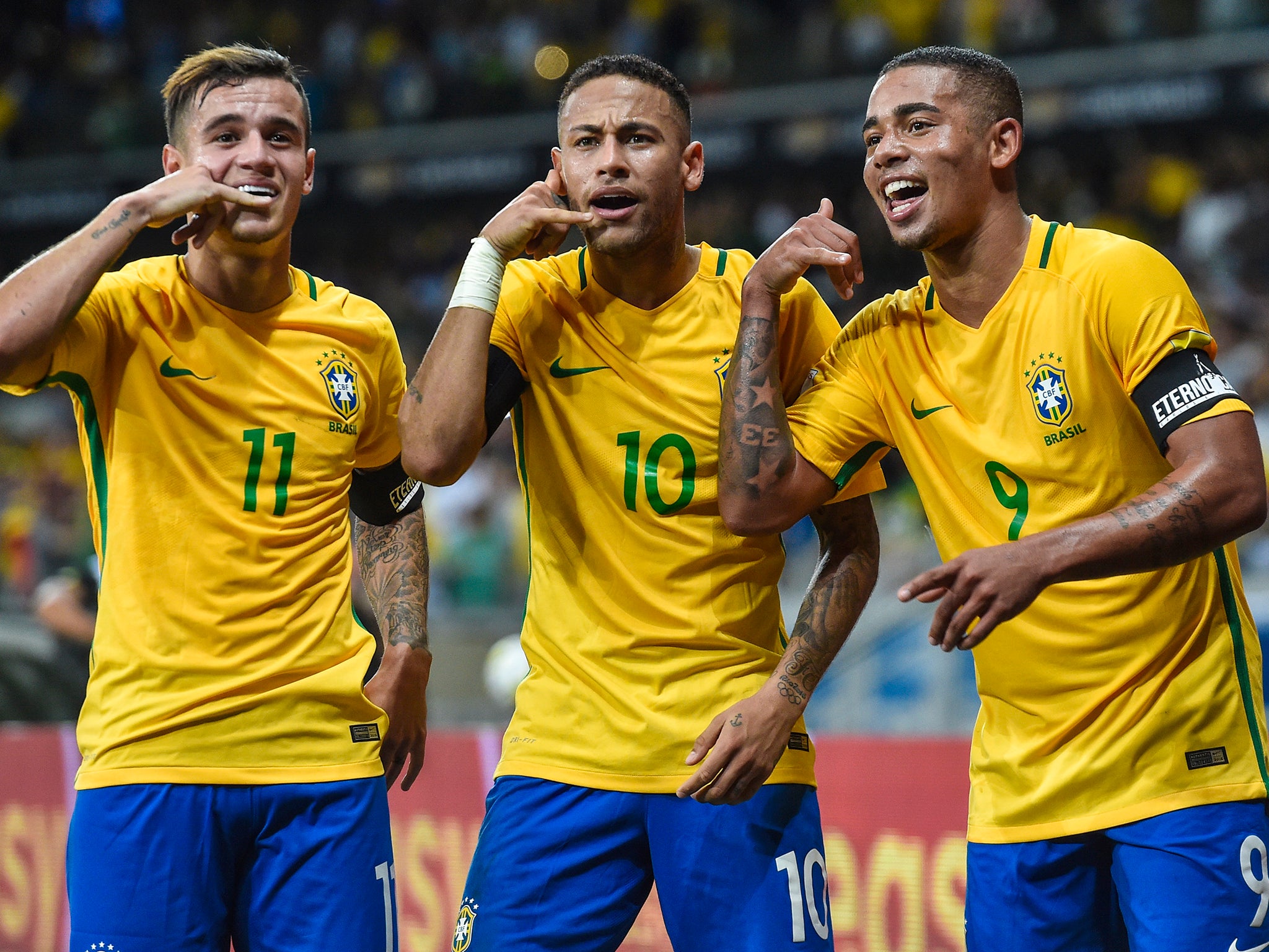 Philippe Coutinho #11, Neymar #10 and Gabriel Jesus #9 of Brazil celebrate a goal against Argentina during their 2018 FIFA World Cup Russia Qualifier