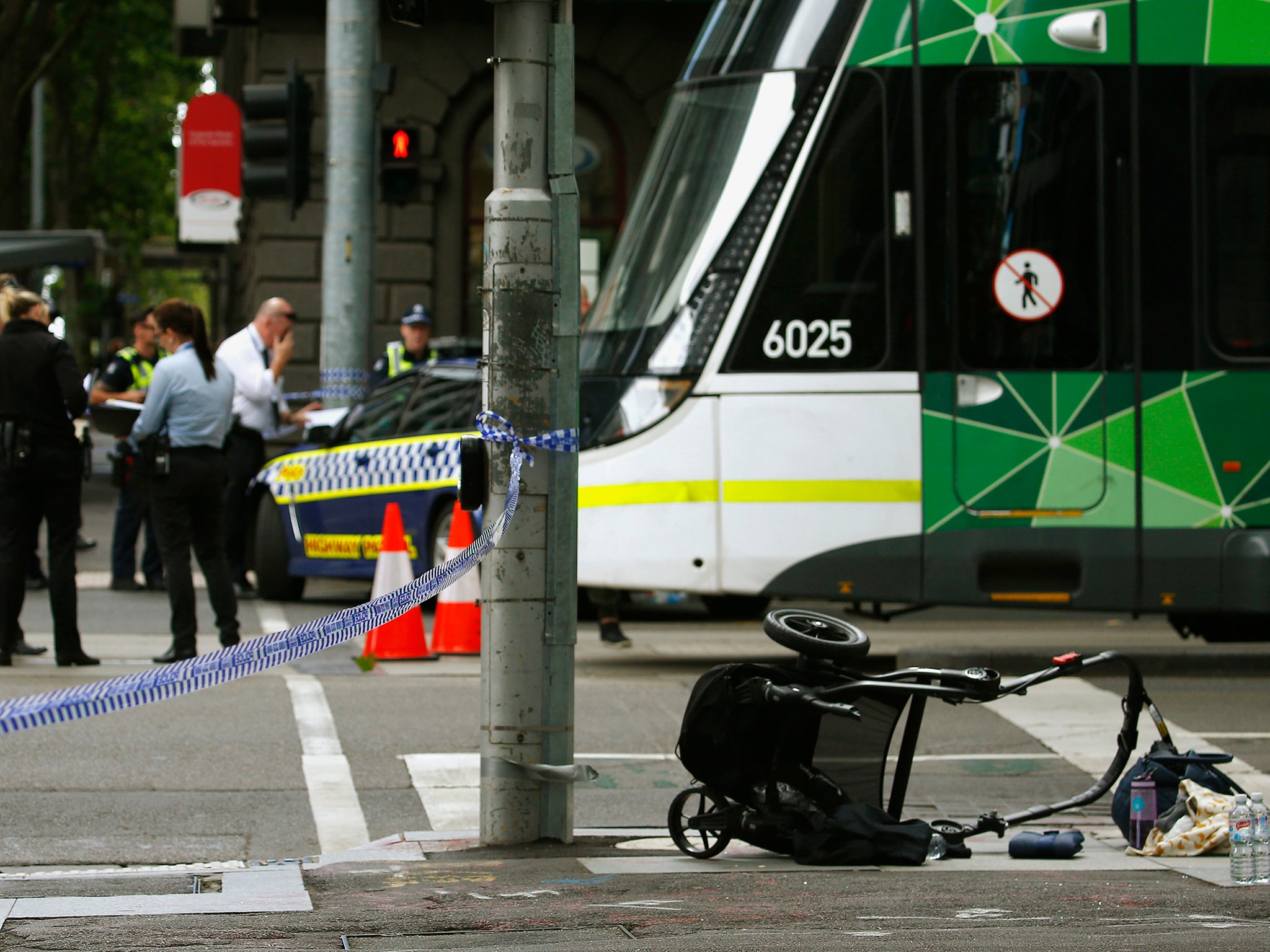 A pram is seen as police cordon off Bourke Street mall