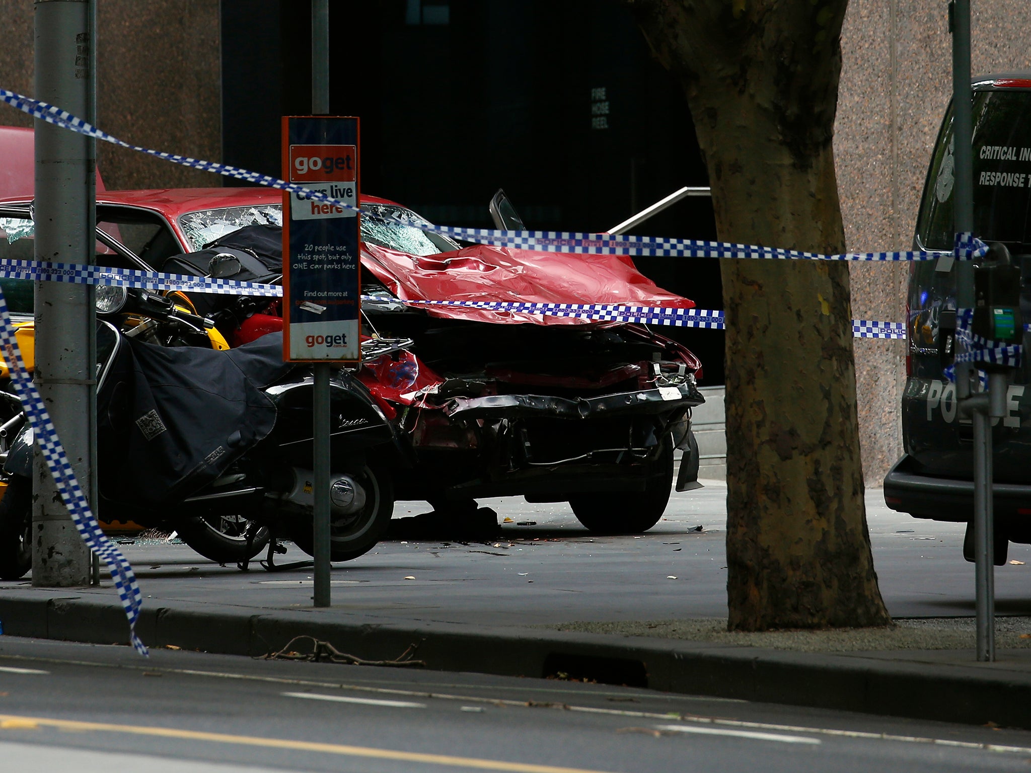 The wreckage of a car is seen as police cordoned off Bourke Street mall after a car hit pedestrians in central Melbourne