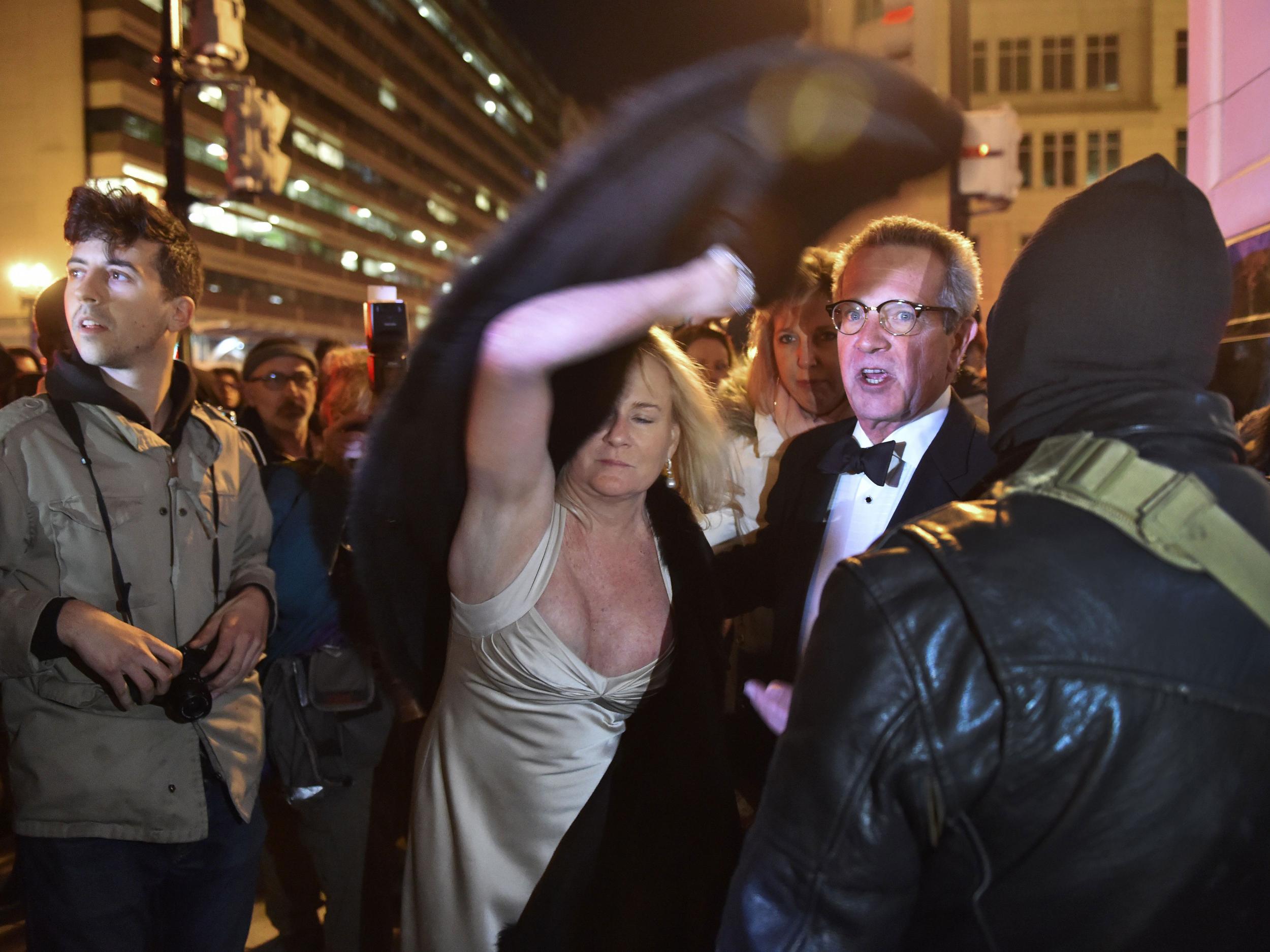 People seen walking in and out of the National Press Club were heckled by protesters