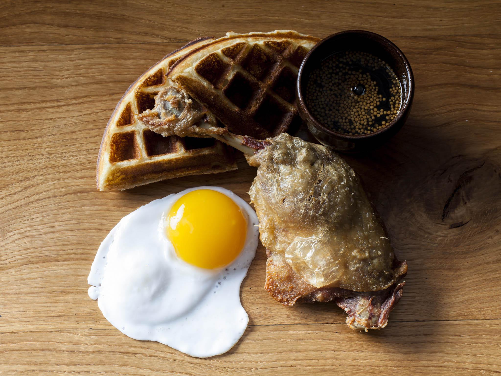 The signature dish if confit duck with a waffle and fried egg is a must try