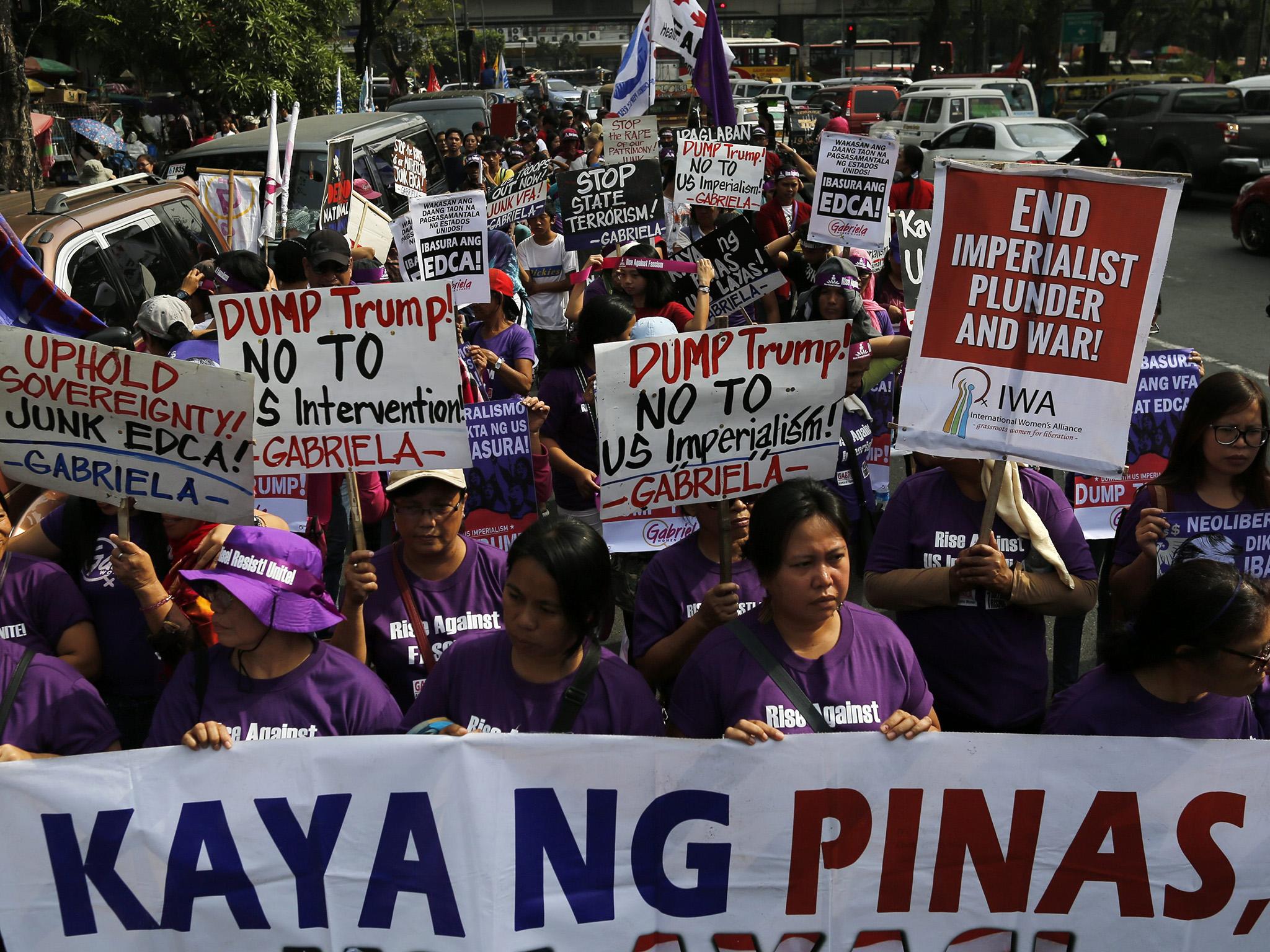 Filippino protesters outside the US embassy in Manila ahead of the Trump inauguration