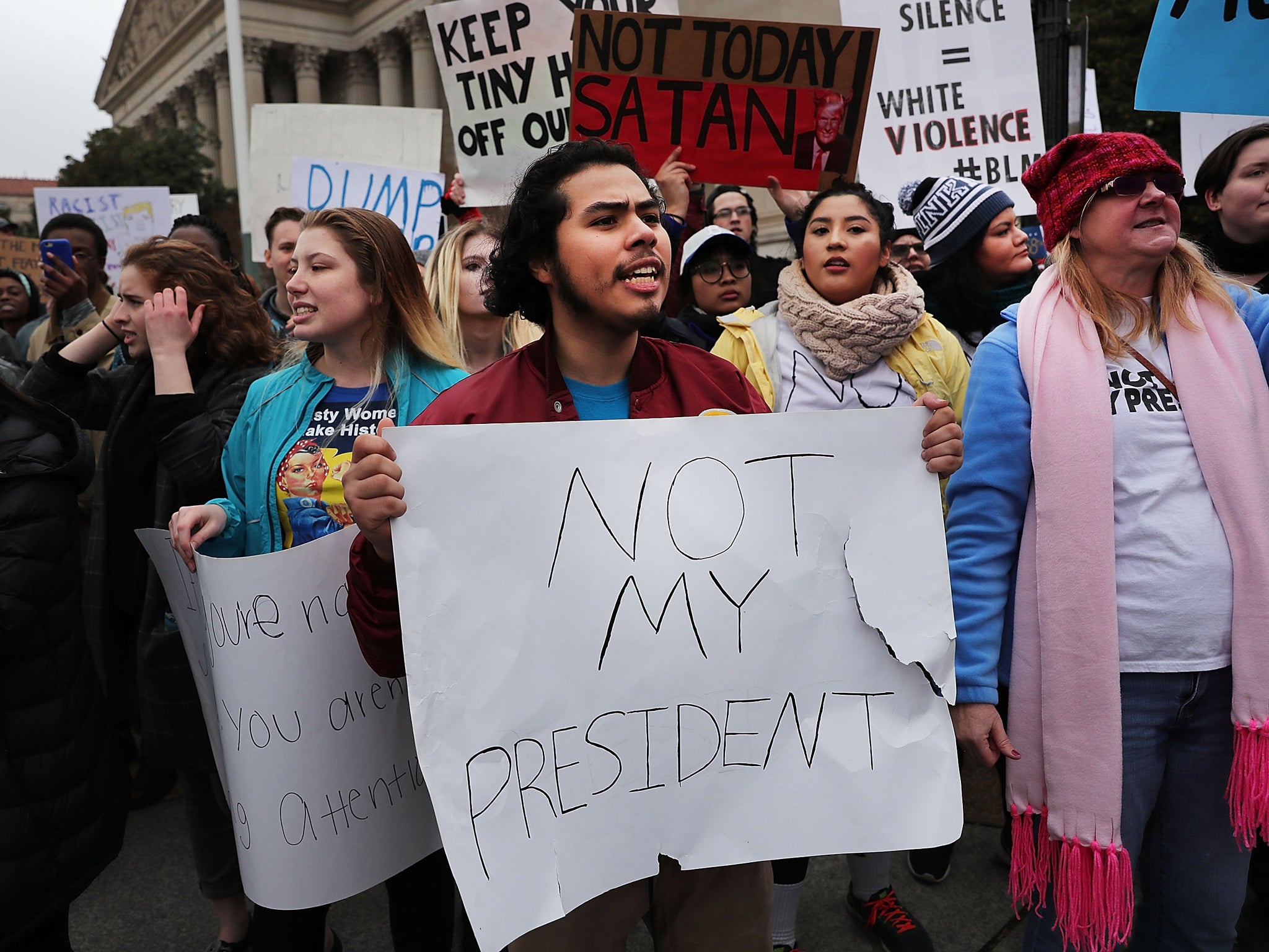 Anti-Trump protesters demonstrate near the National Mall