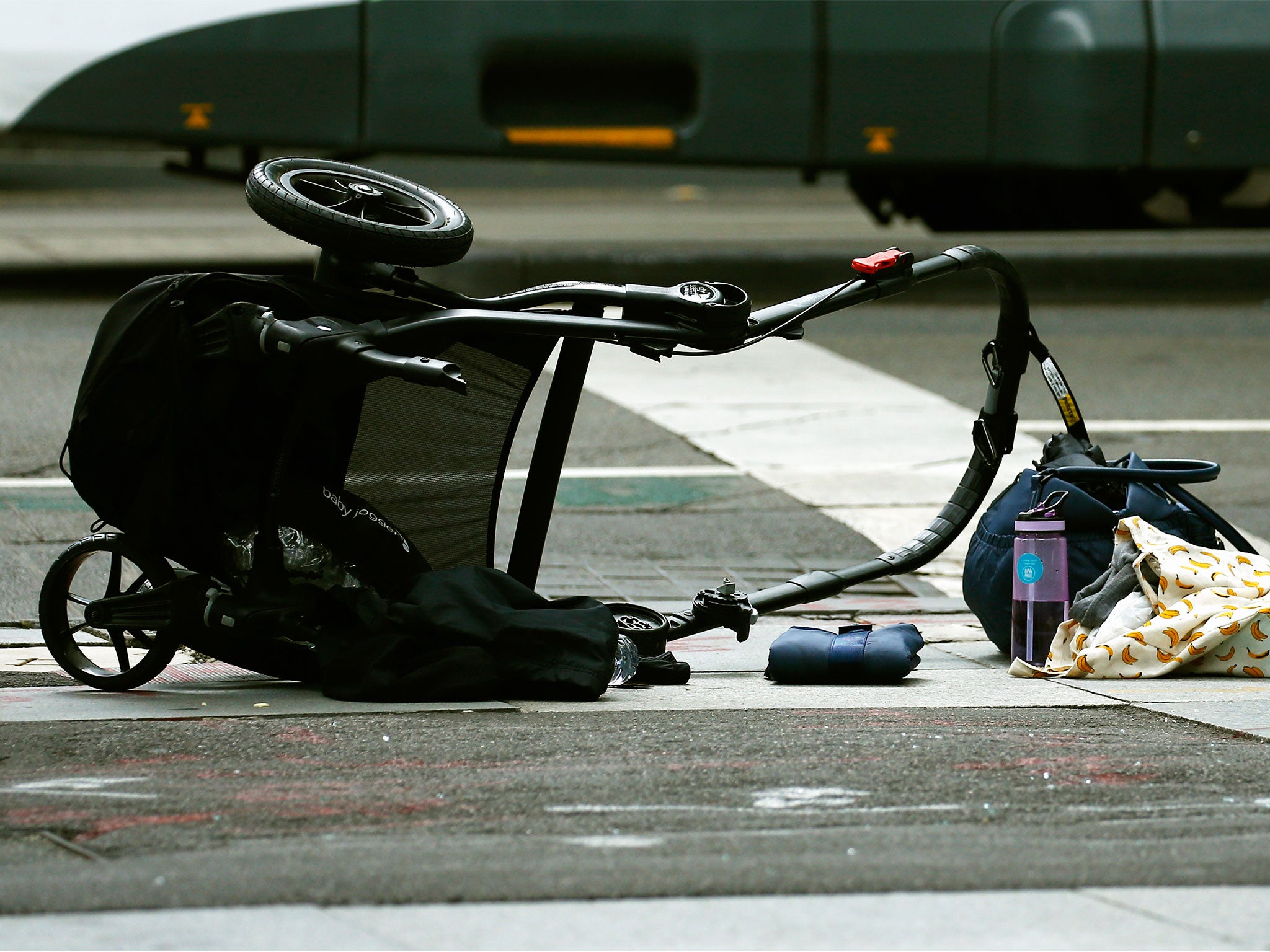 A pram is seen as police cordon off Bourke Street mall, after a car hit pedestrians in central Melbourne