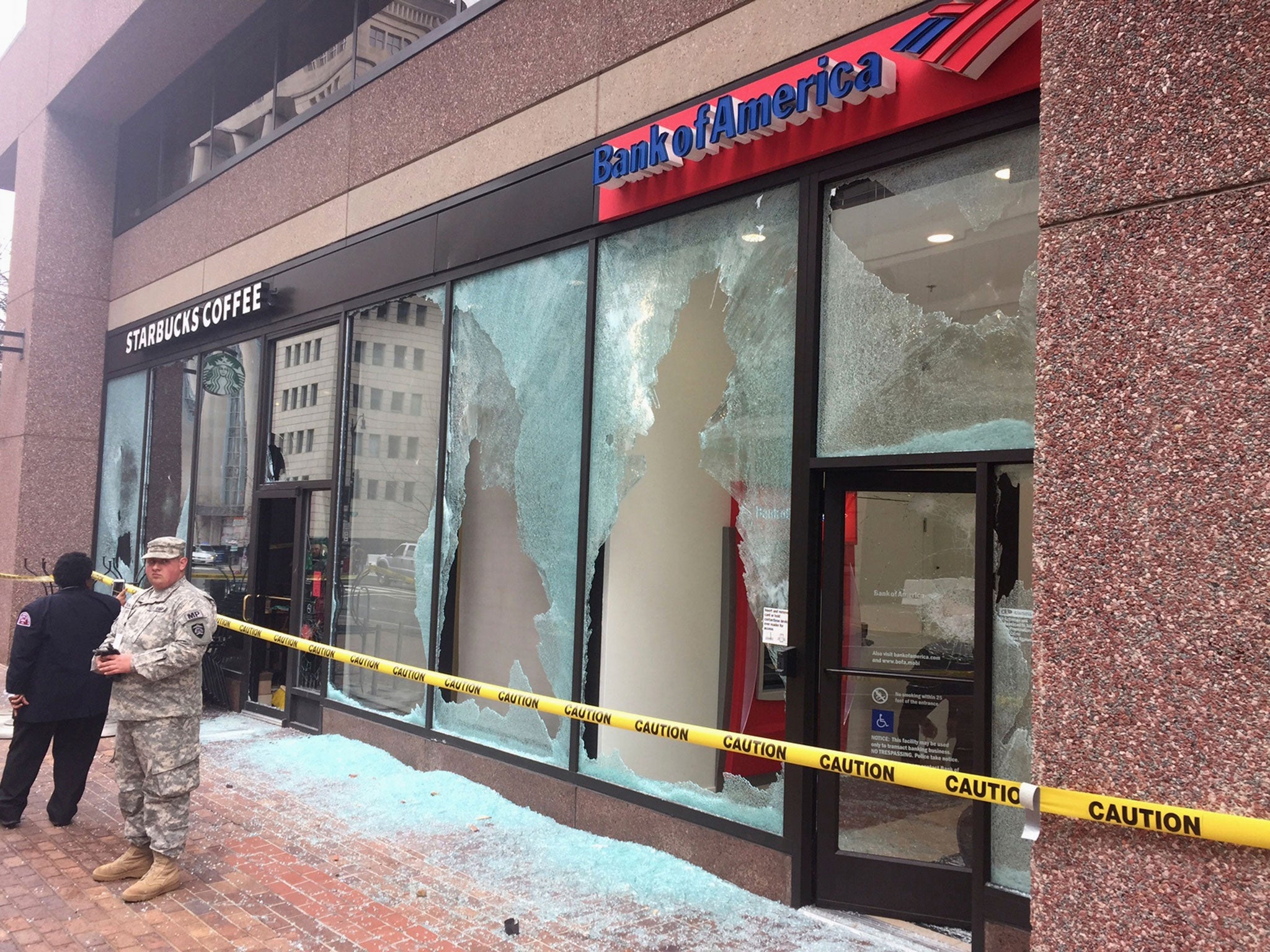 Broken windows at businesses in Washington after a confrontation with protestors shortly before Donald Trump's inauguration.