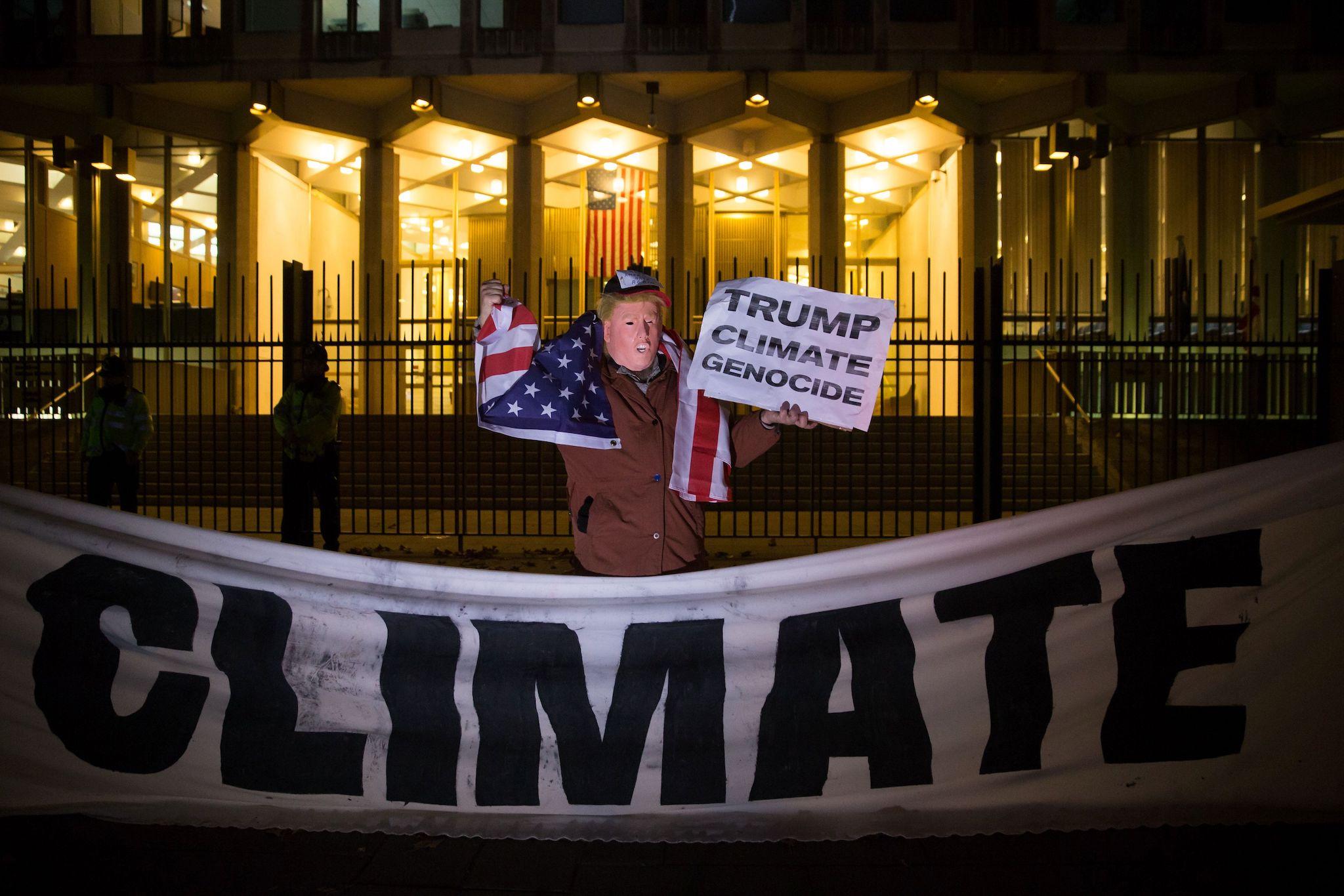 Donald Trump's views on climate change have led to protests around the world, including this one at the US Embassy in London