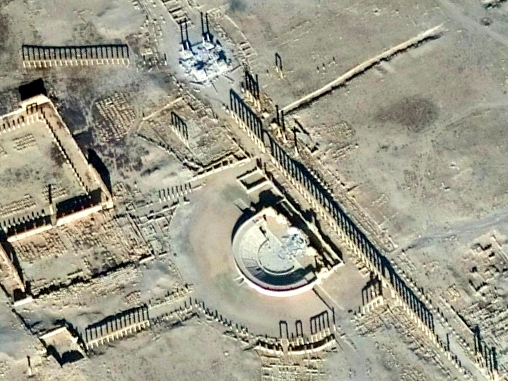 A satellite picture shows the damage in the Tetrapylon and the Roman Amphitheatre in Palmyra