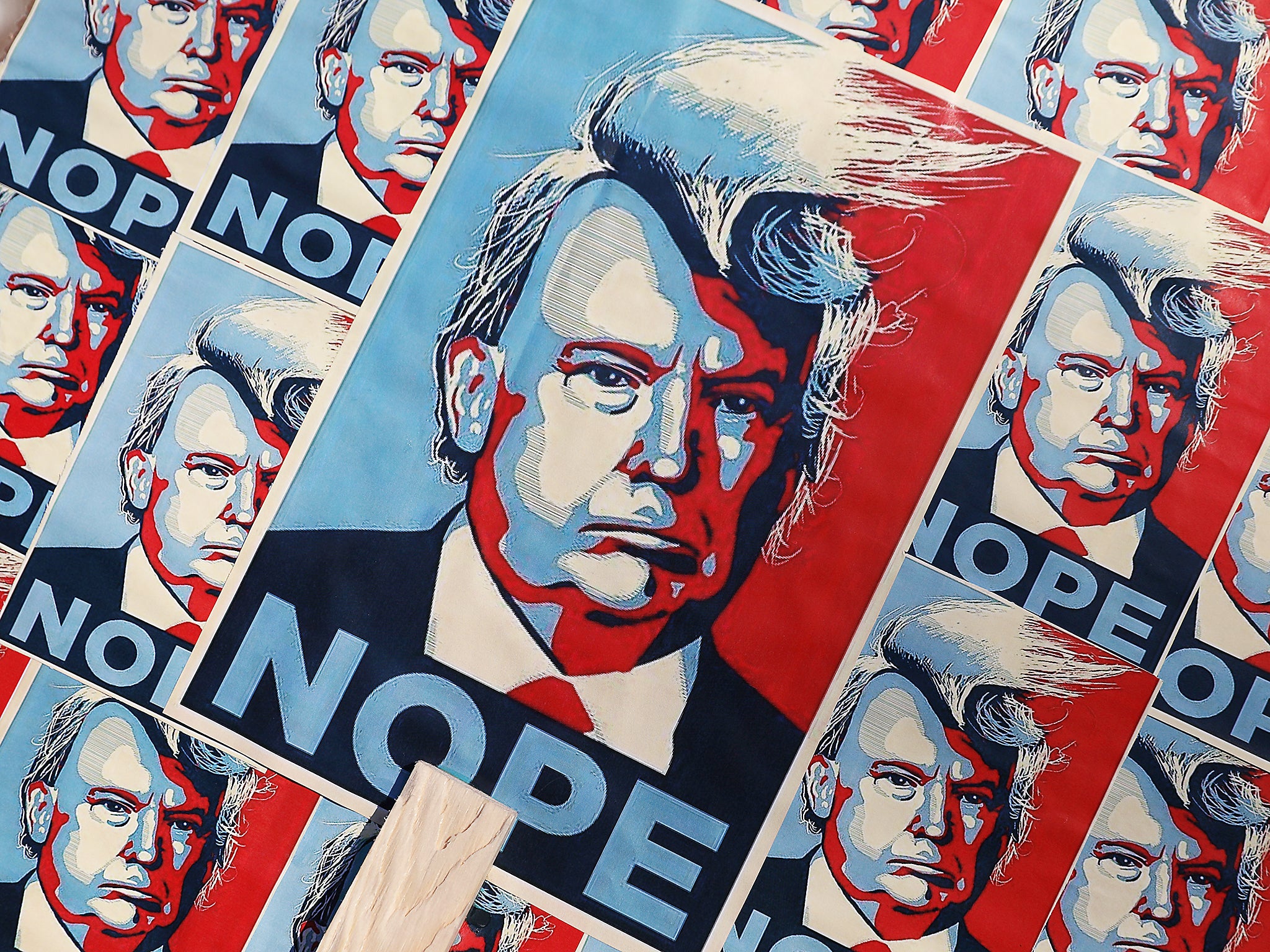 An image of President Donald Trump is seen on a placard during the Women’s March in London, UK