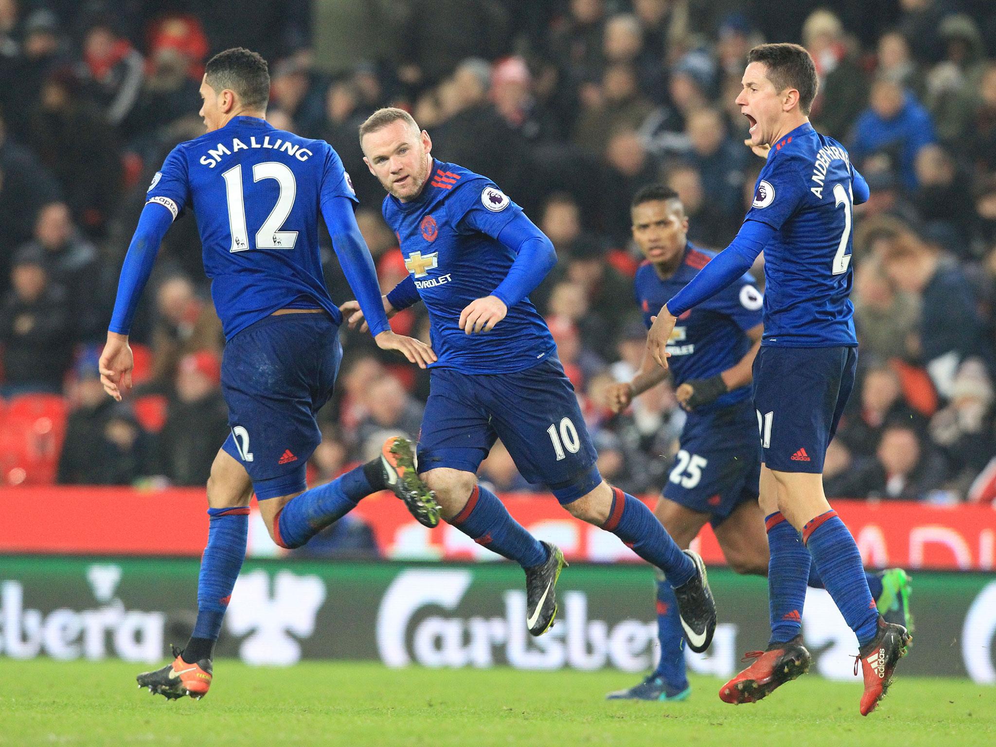 Rooney celebrates scoring his club-record 250th goal for Manchester United