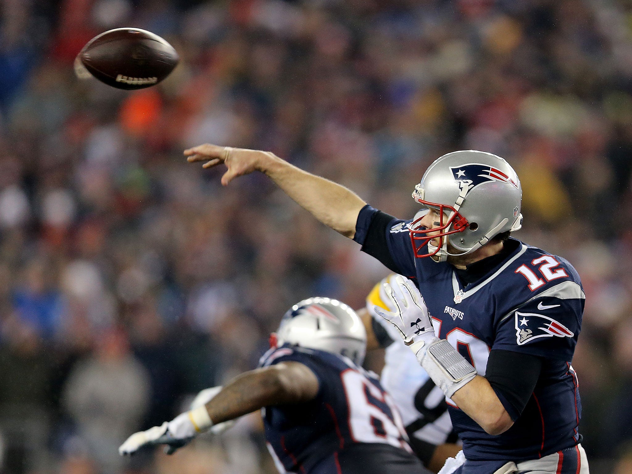 Tom Brady of the New England Patriots attempts a pass against the Pittsburgh Steelers during the fourth quarter in the AFC Championship Game at Gillette Stadium