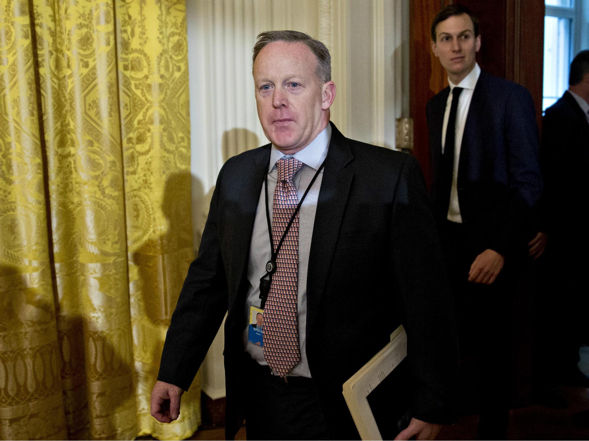 Sean Spicer, White House press secretary, arrives to a swearing in ceremony of White House senior staff in the East Room of the White House on January 22, 2017 in Washington, DC