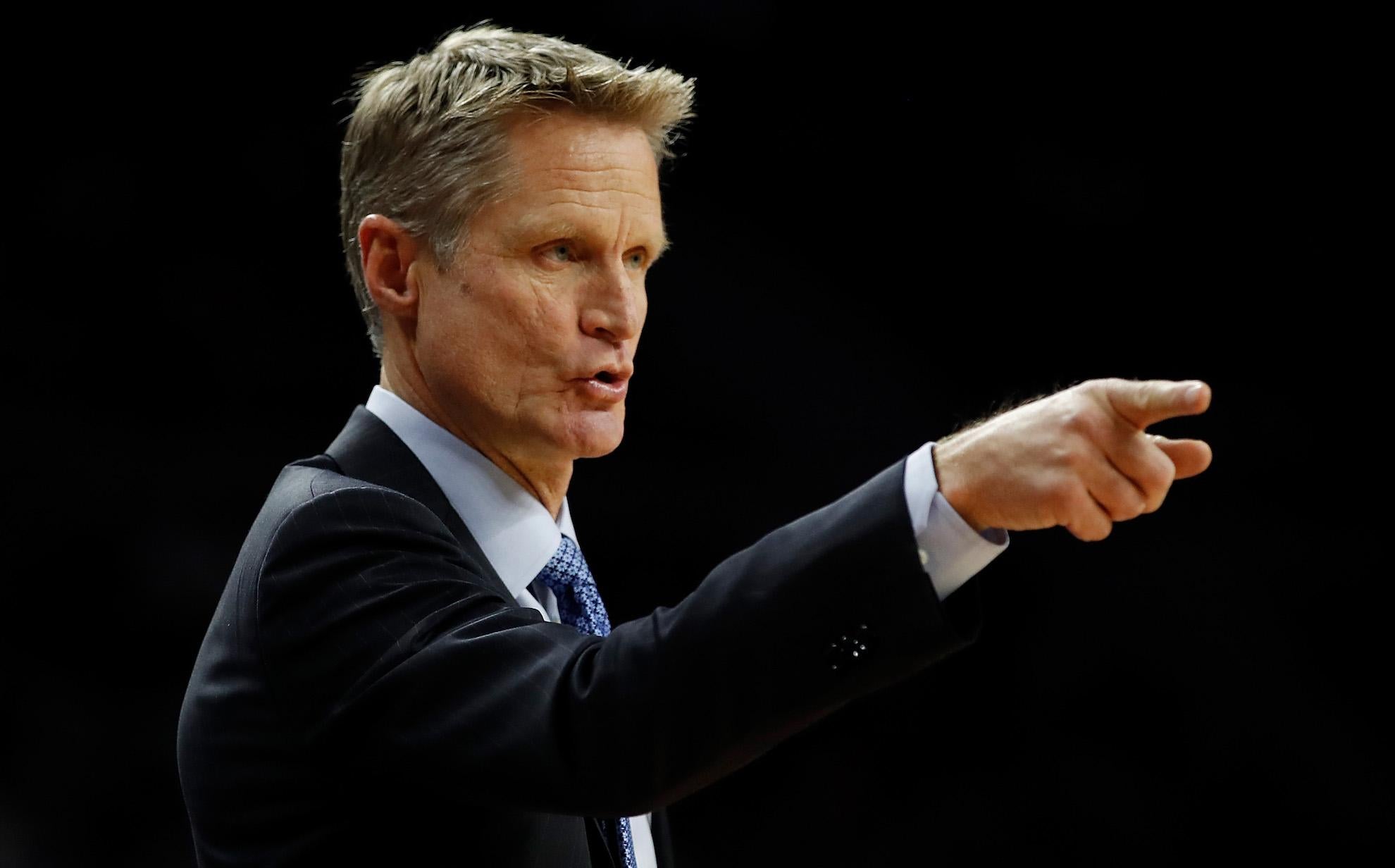 Steve Kerr looks on from the bench while playing the Detroit Pistons at the Palace of Auburn Hills on December 23, 2016 in Auburn Hills, Michigan.