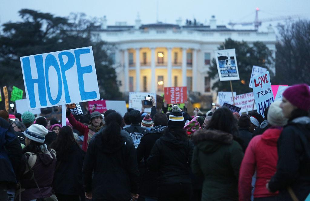 Protesters gather outside the White House at the finish of the Women's March on Washington on January 21, 2017 in Washington, DC. Large crowds attended the anti-Trump rally a day after U.S. President Donald Trump was sworn in as the 45th U.S. president.