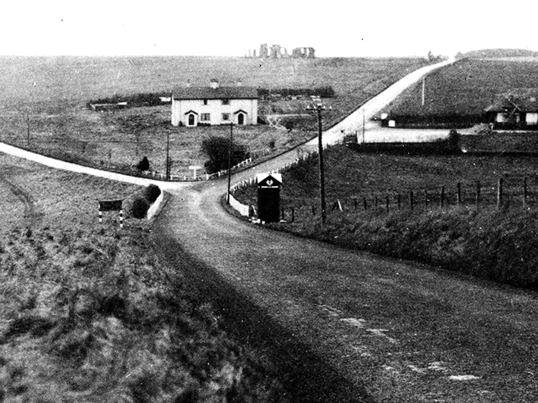 &#13;
The A303, pictured in 1930 running to the left, has also become part of the area’s history (National Archives)&#13;