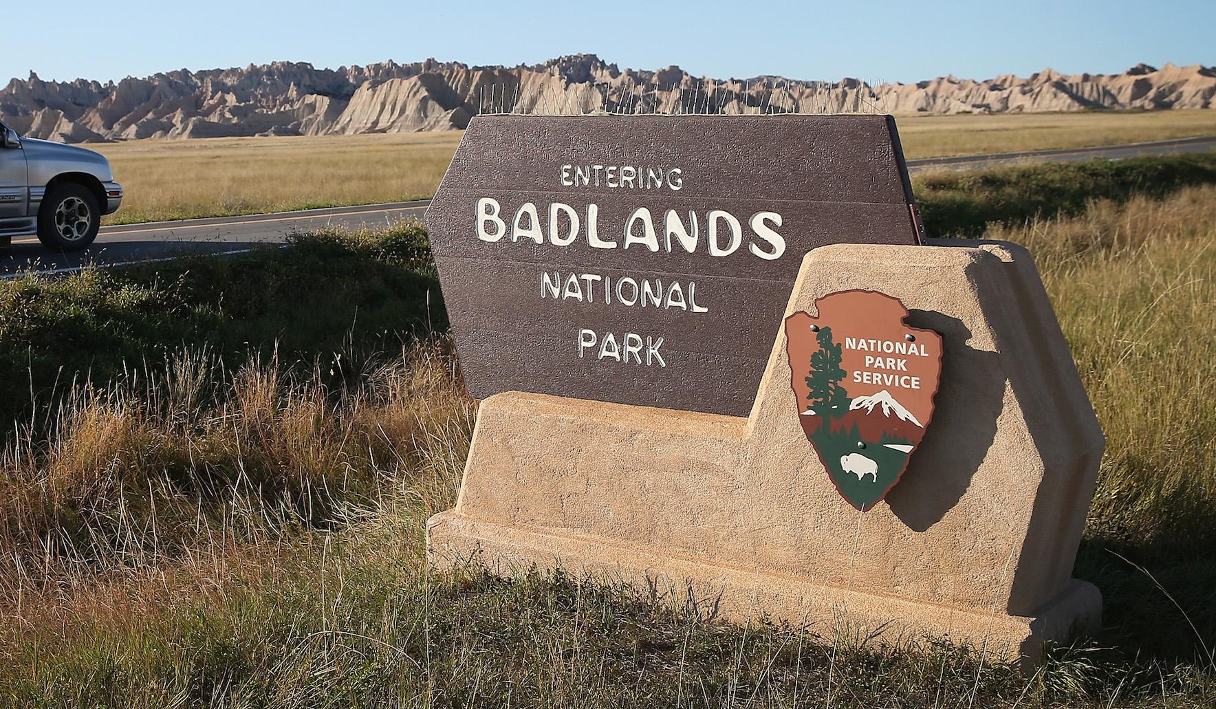 Visitors drive into the Badlands National Park on October 1, 2013 near Wall, South Dakota.