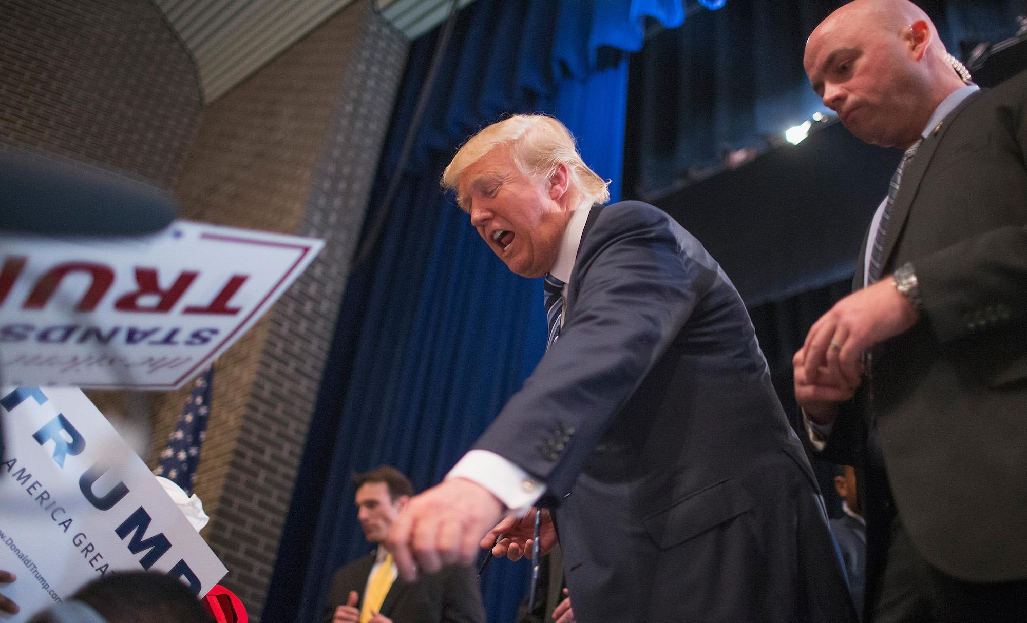 Trump with his Secret Service detail in November 12, 2015.