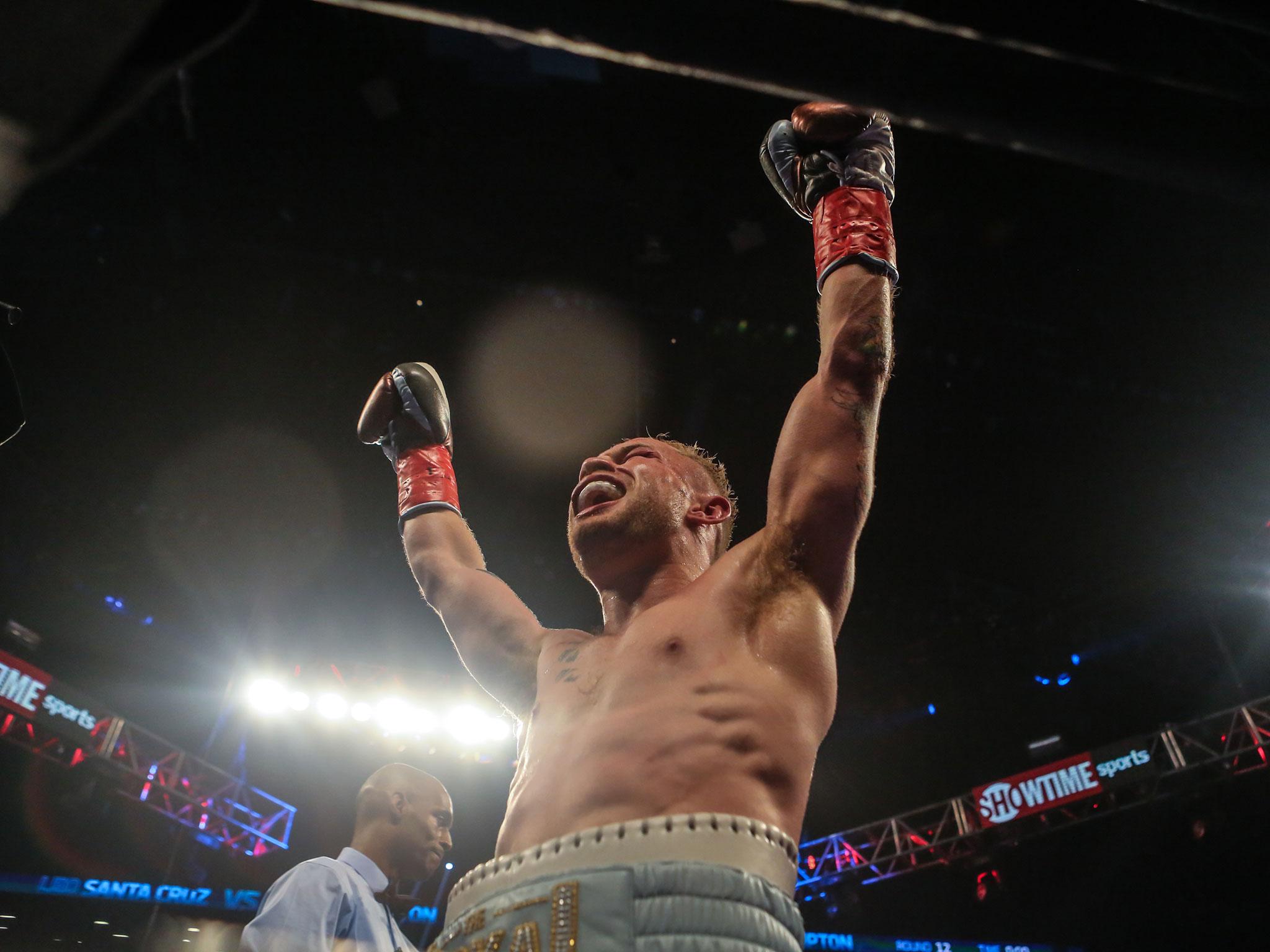 Frampton celebrates his victory over Santa Cruz in last year's fight