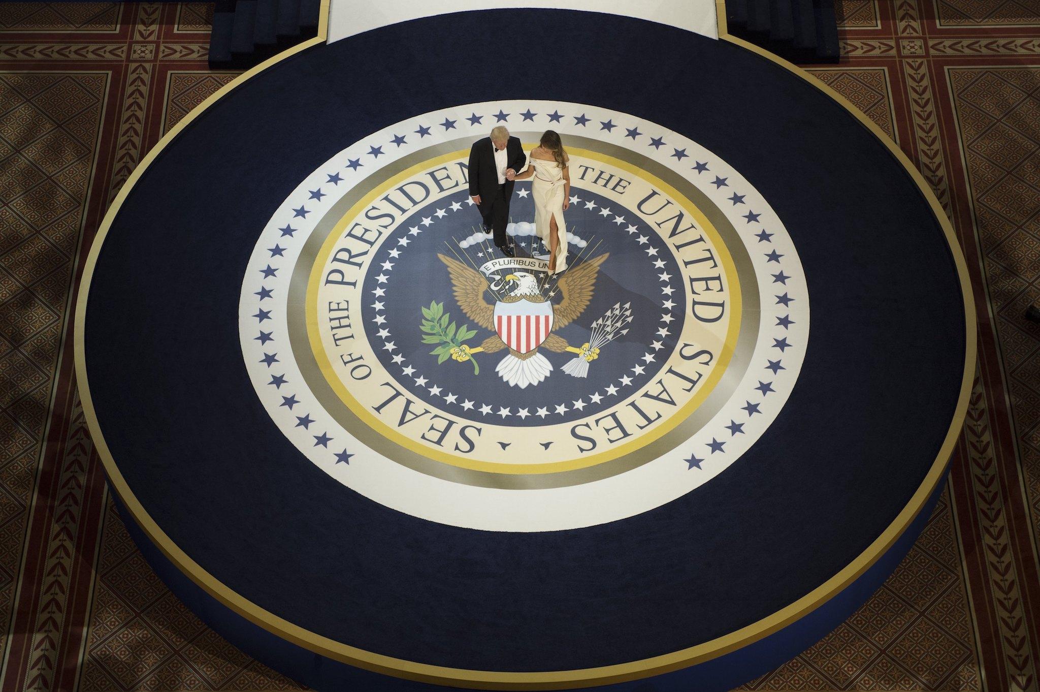 US President Donald Trump and First Lady Melania Trump dance during the Armed Services Ball on January 20, 2017 in Washington, DC