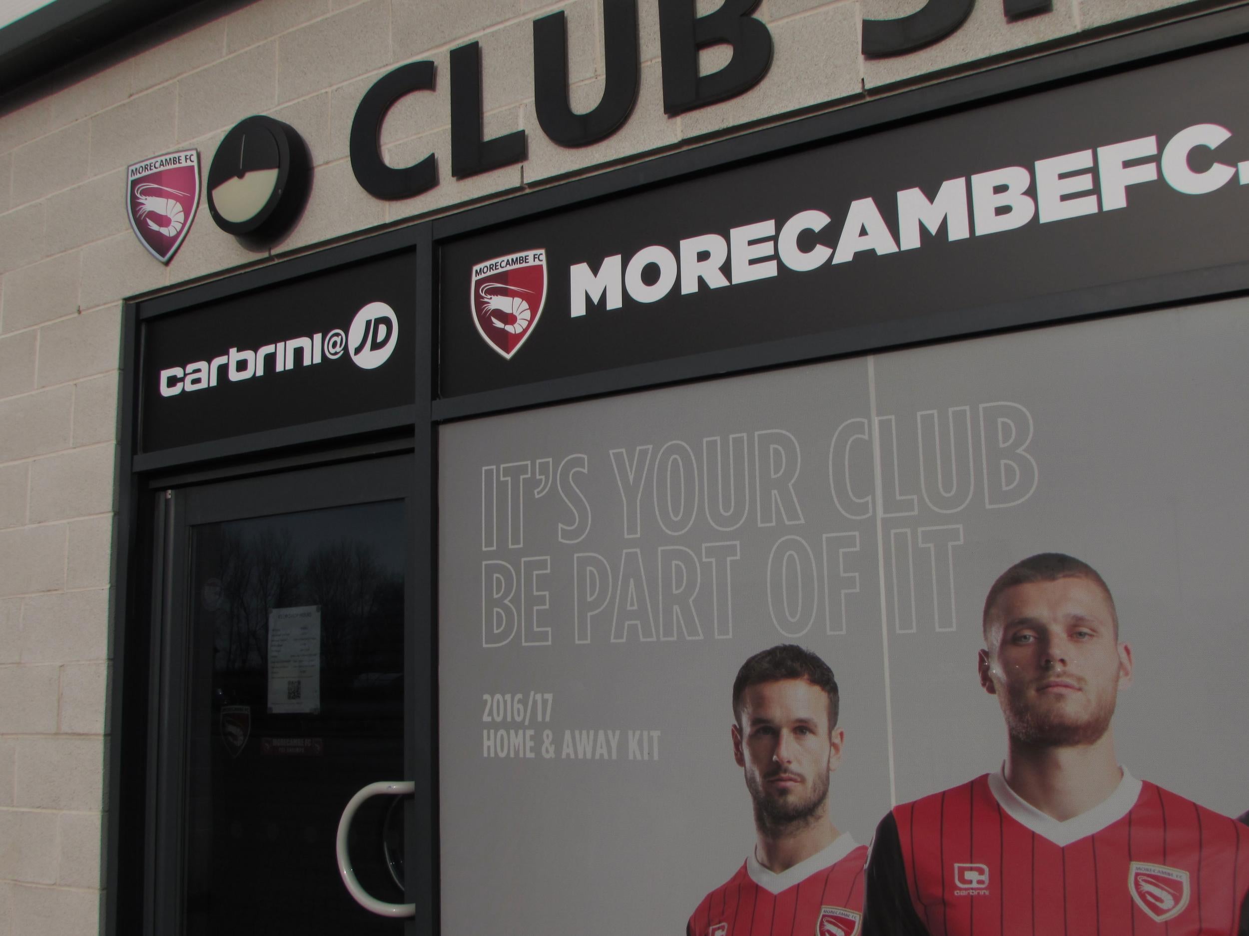 'It's your club, be part of it' reads a sad sign in the window at Morecambe