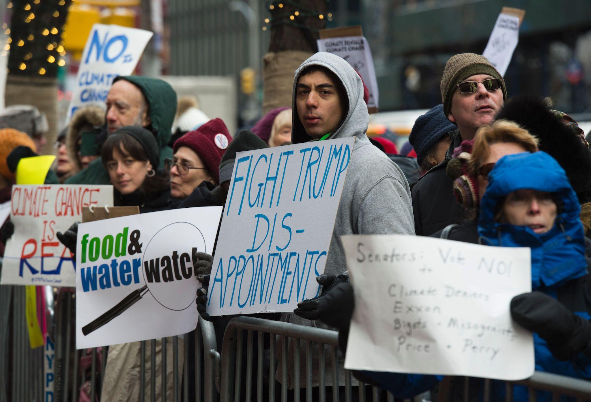 Climate activists rally, to urge politicians to stand against climate denial and hate, January 9, 2017 in New York