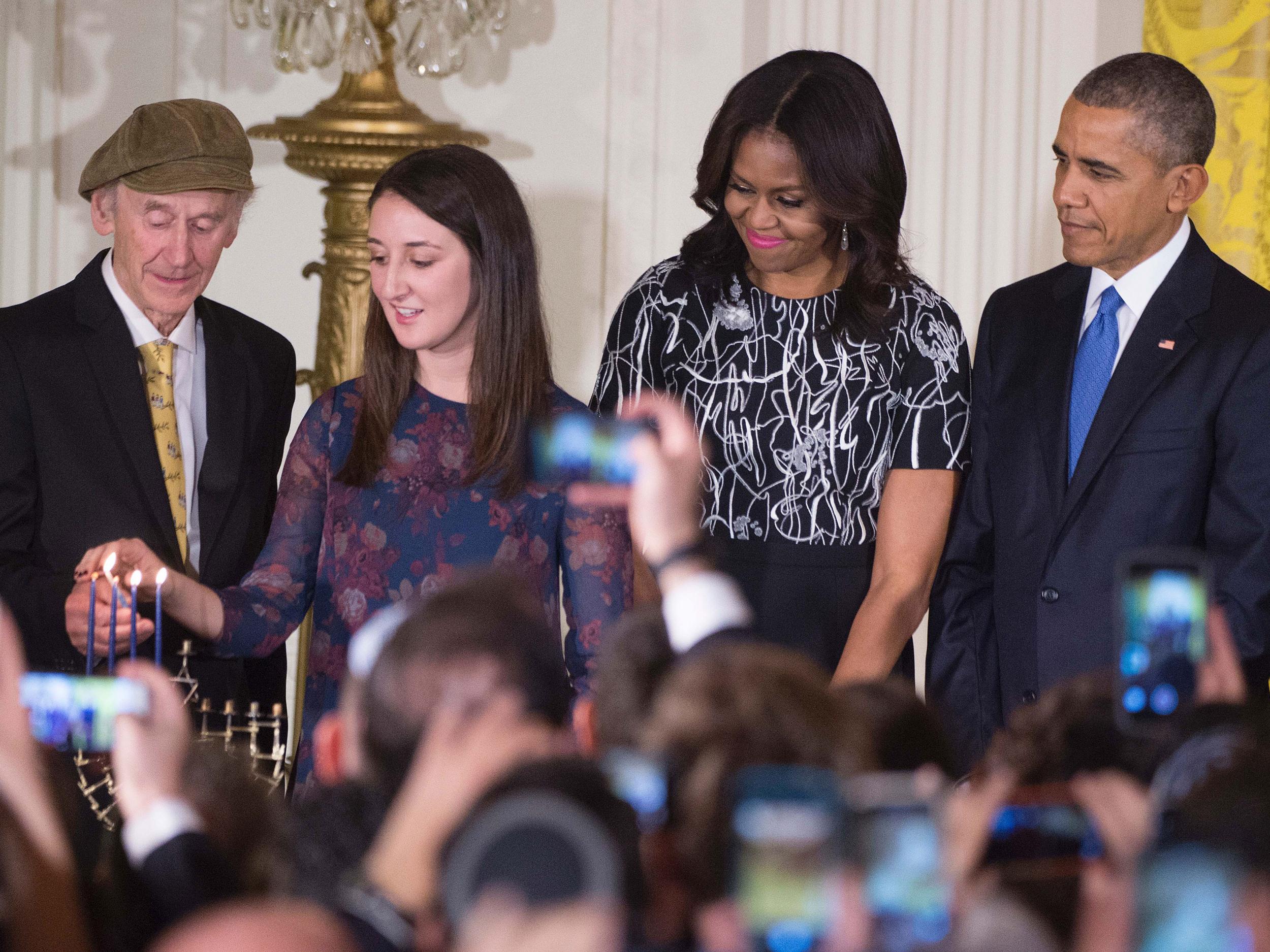 Manny Lindenbaum, pictured at a Hanakkah ceremony at the White House in December 2015, talked of how the US was built with refugees