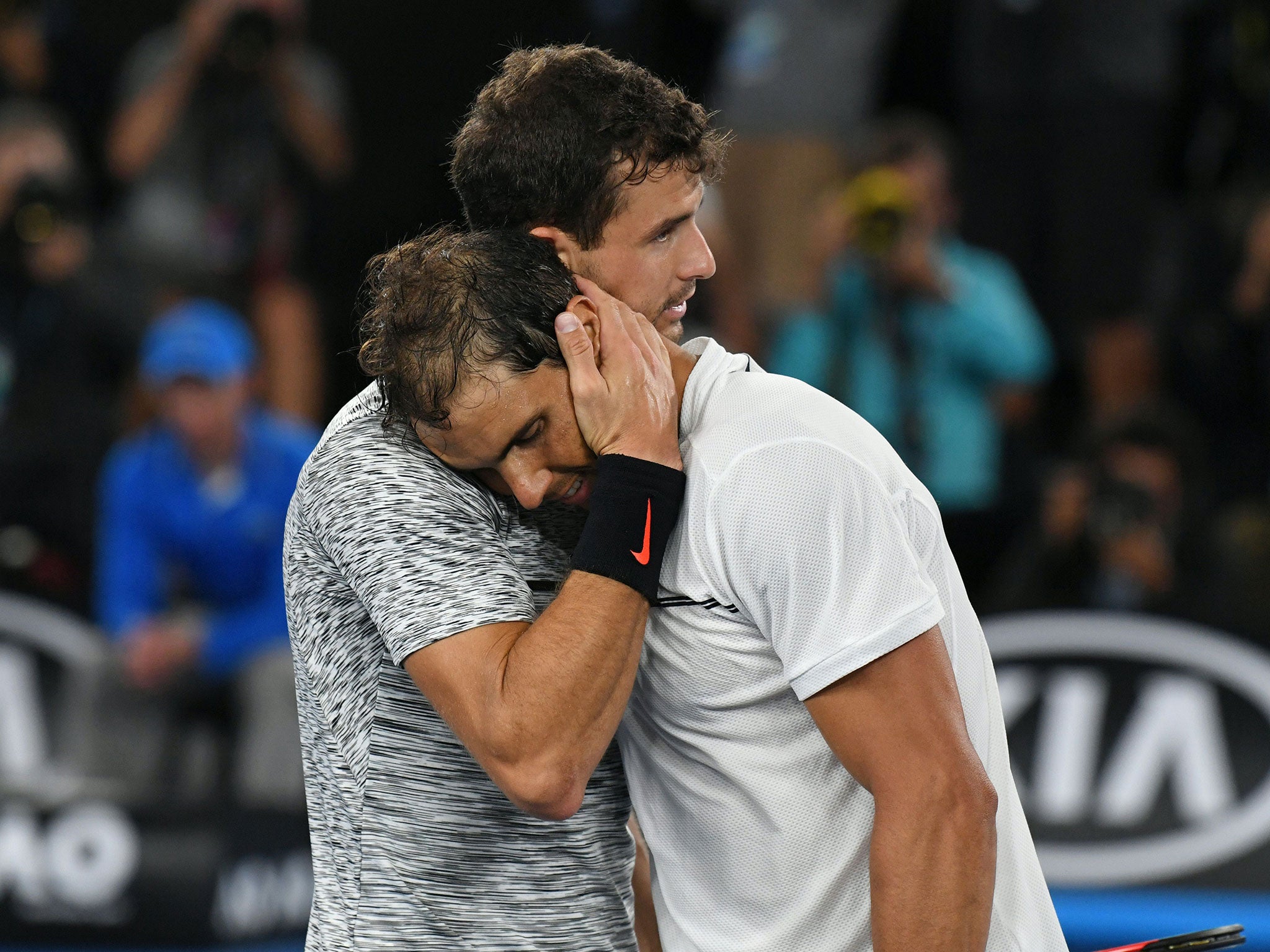 The two players embrace after their epic semi-final clash