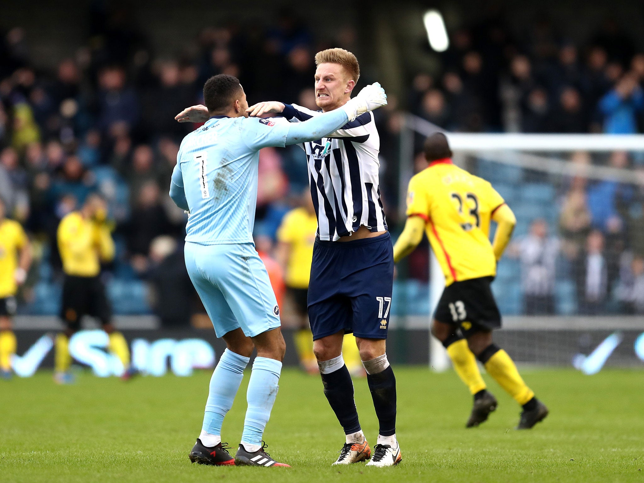 Byron Webster and Jordan Archer celebrate their victory