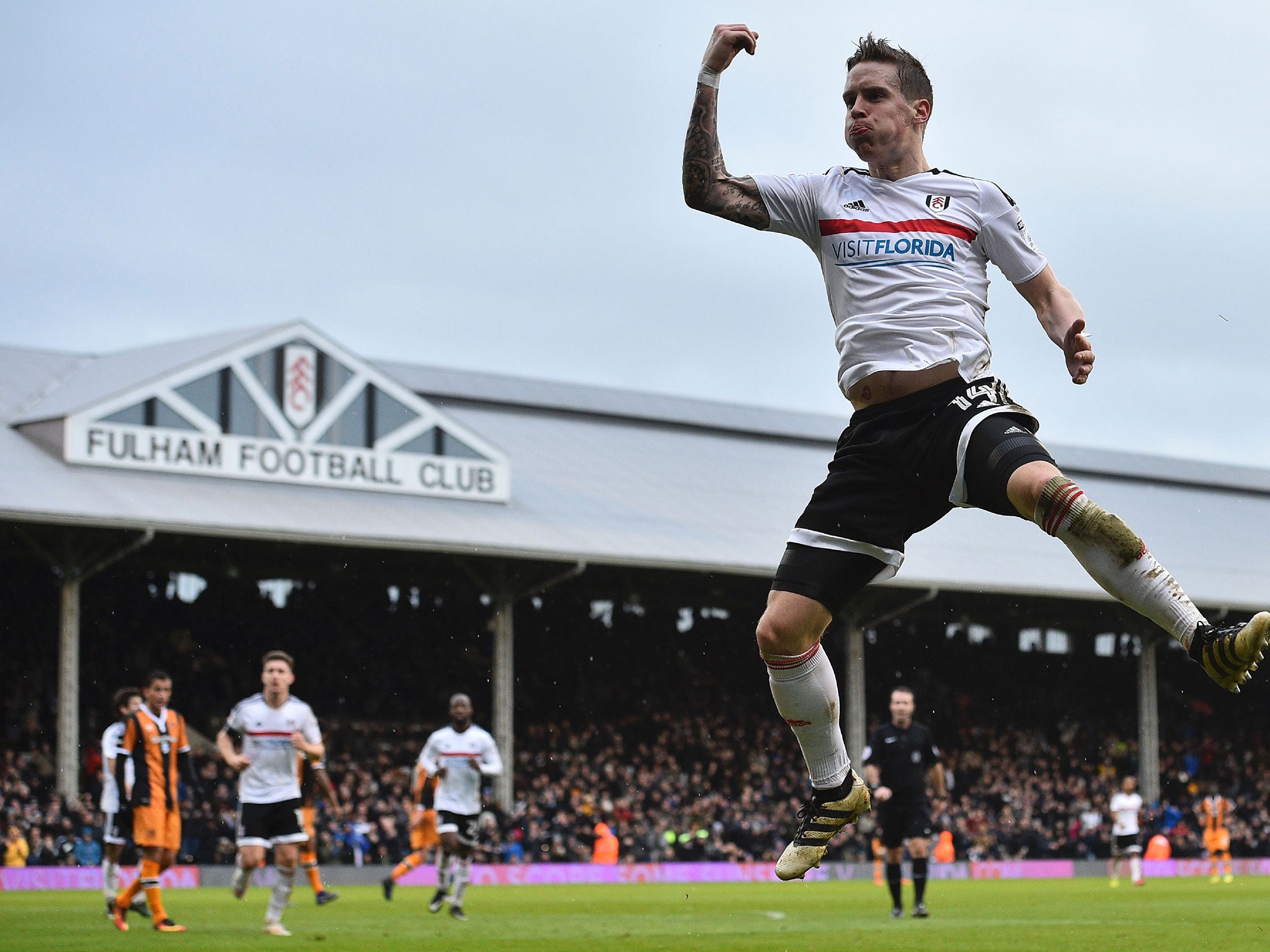 Norwegian midfielder Stefan Johansen celebrates scoring Fulham's fourth goal