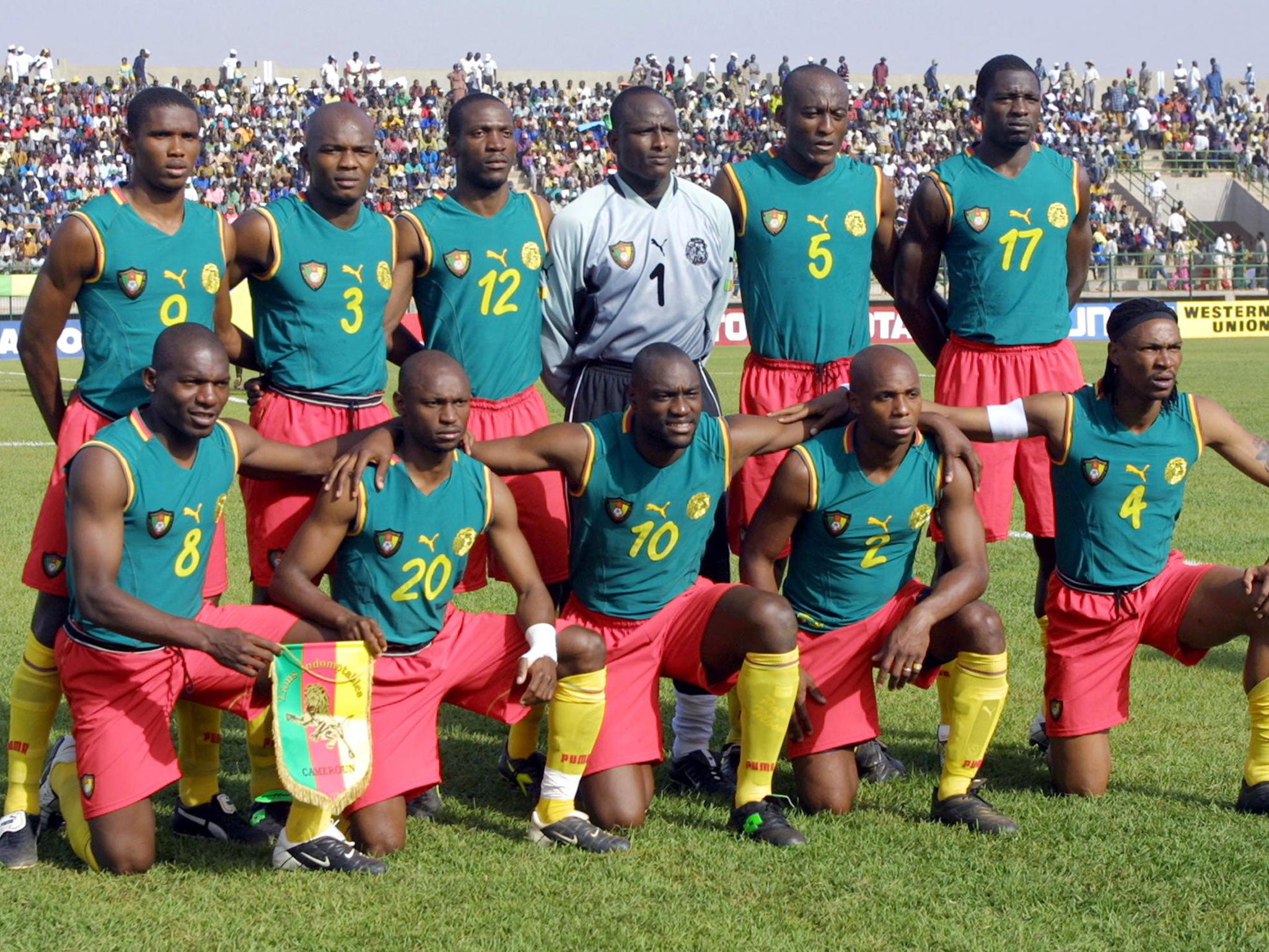 Lauren with Cameroon's national team in February 2002