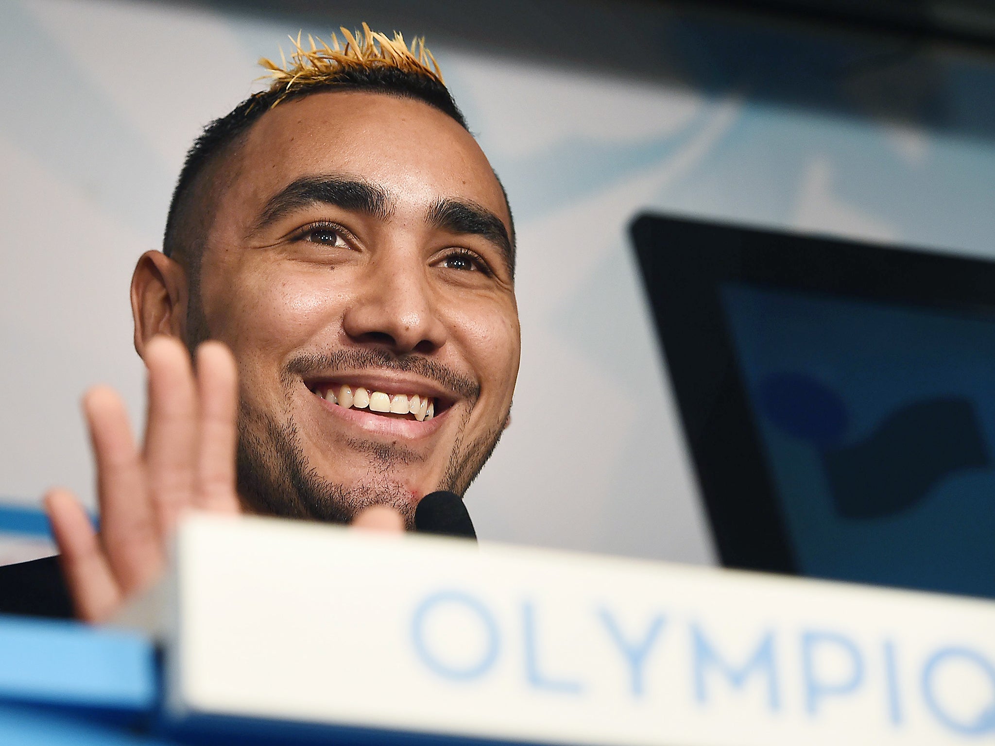 Olympique de Marseille's new forward Dimitri Payet smiles during a press conference at Robert-Louis Dreyfus Stadium in Marseille.