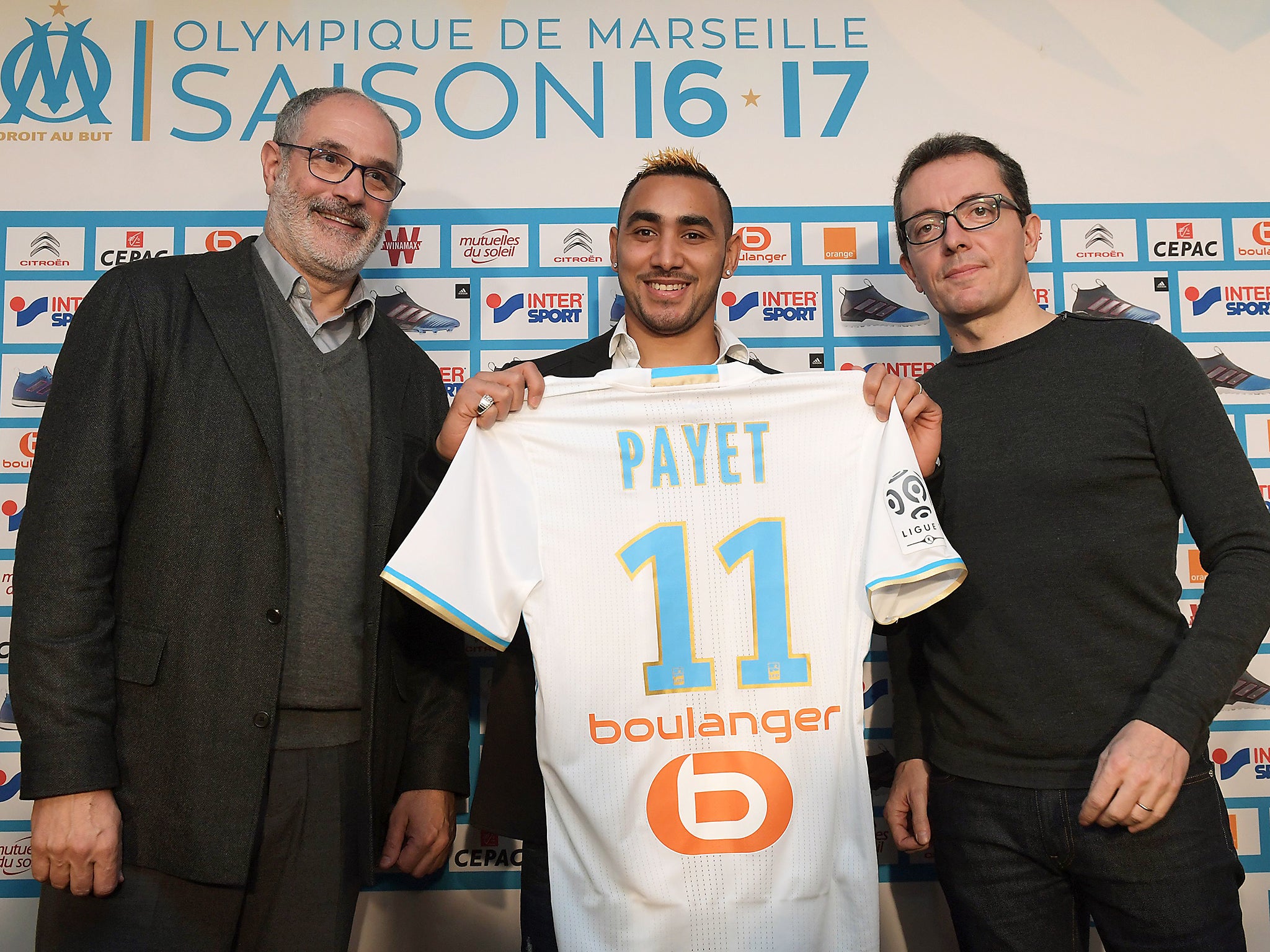 Olympique de Marseille's new forward Dimitri Payet poses with his jerse