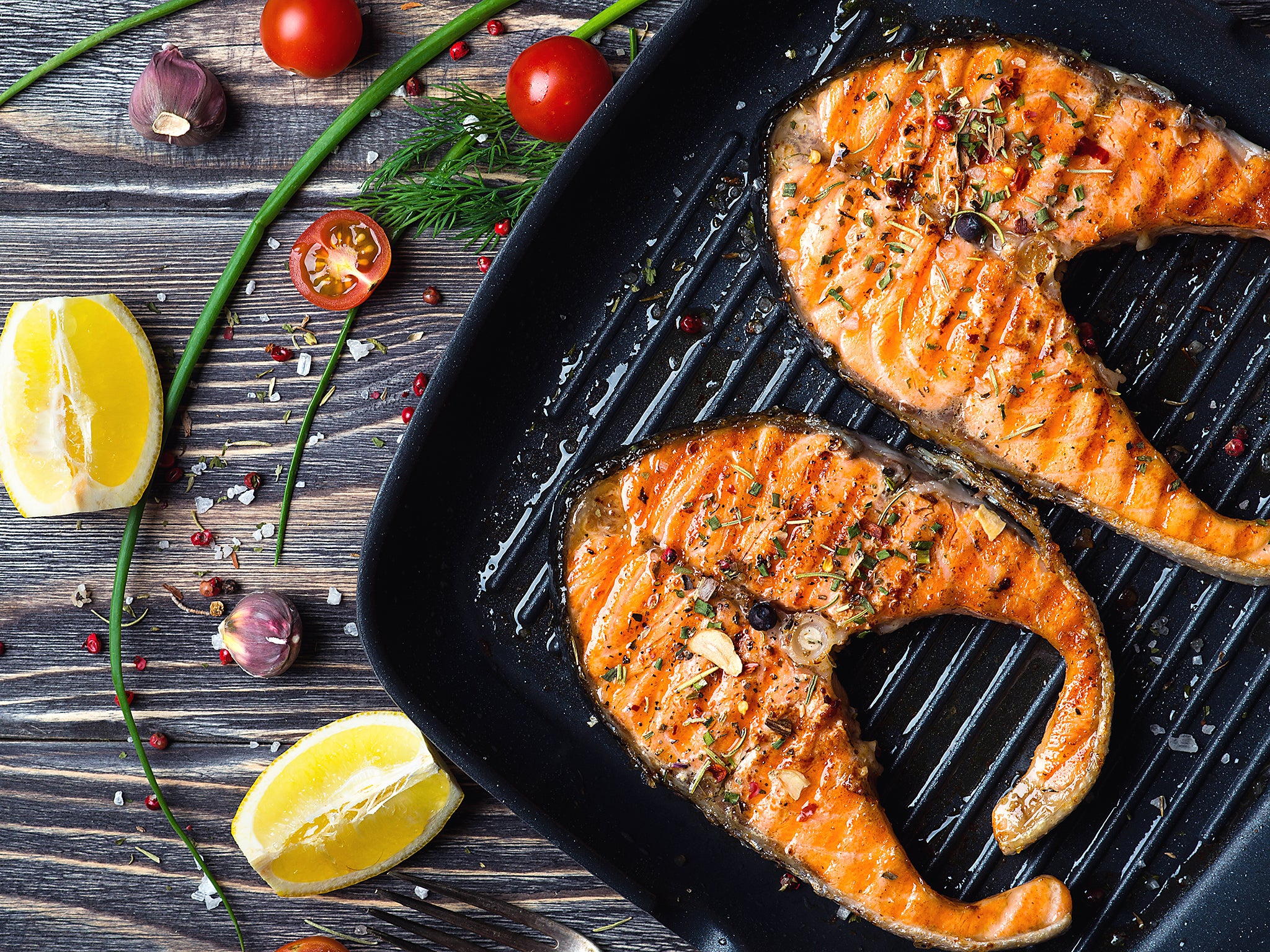 Grilled salmon steaks make for a delicious and healthy dinner rich in B vitamins (Getty)