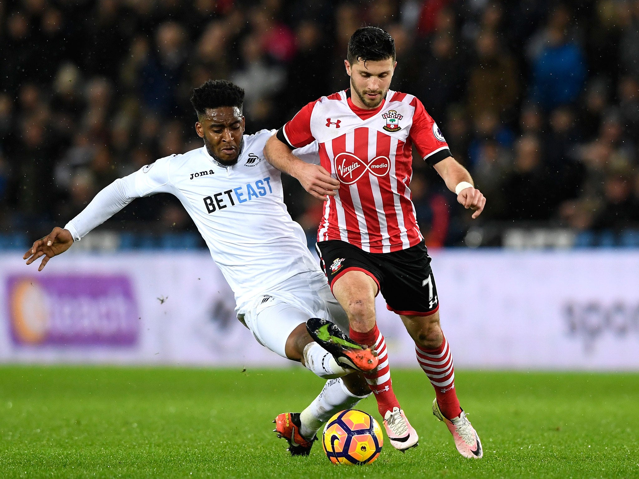 Shane Long and Leroy Fer vie for the ball