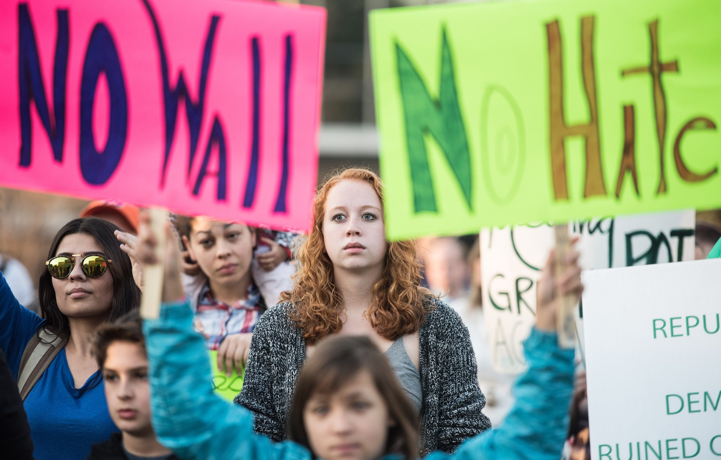 Protestors listen to a speaker at the South Carolina Statehouse during a demonstration in response to the Trump administration's recent executive order blocking entry of refugees and travelers from seven predominantly Muslim countries on January 31, 2017.