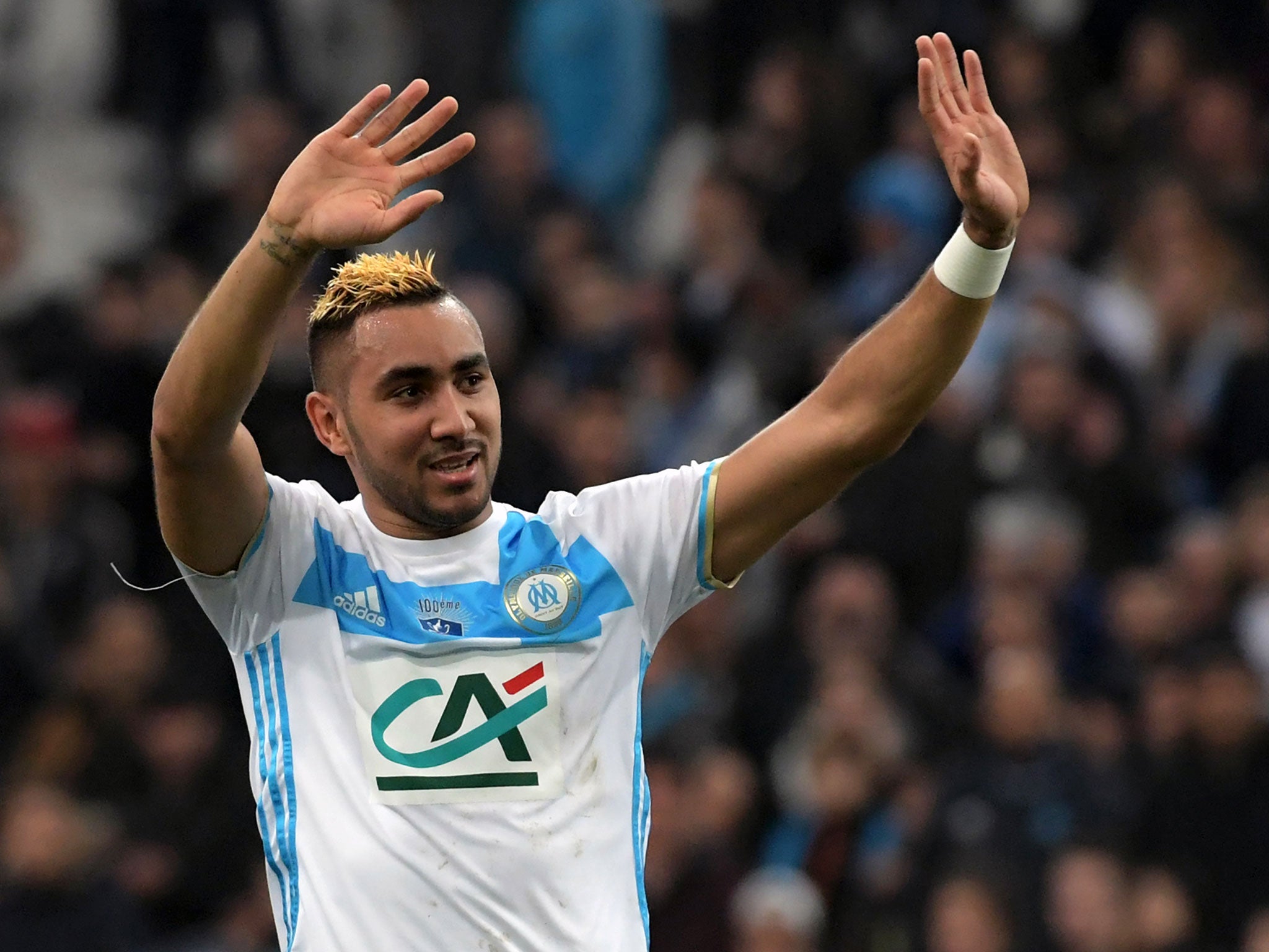 Dimitri Payet waves to the Marseille fans after making his return for the Ligue 1 club