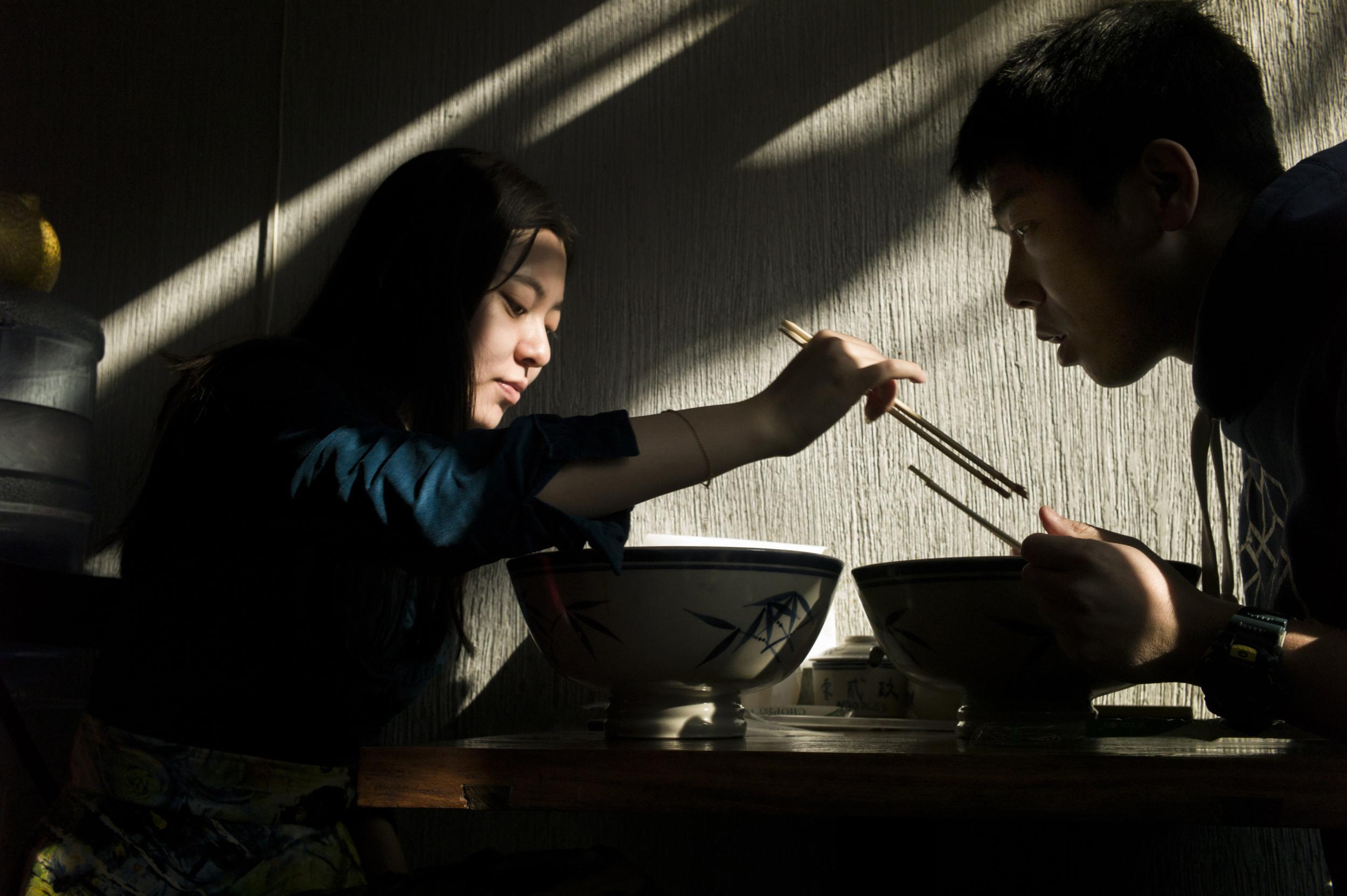 Never rest your chopsticks vertically in a bowl of rice in China or Japan (Getty)