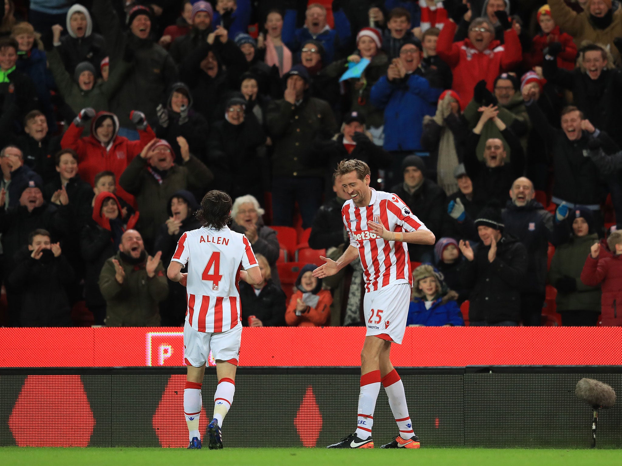 Peter Crouch celebrates his 100th Premier League goal