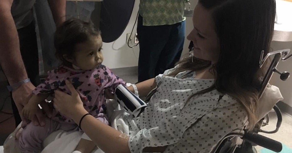 Kiersten Miles pictured with baby Talia after their operations