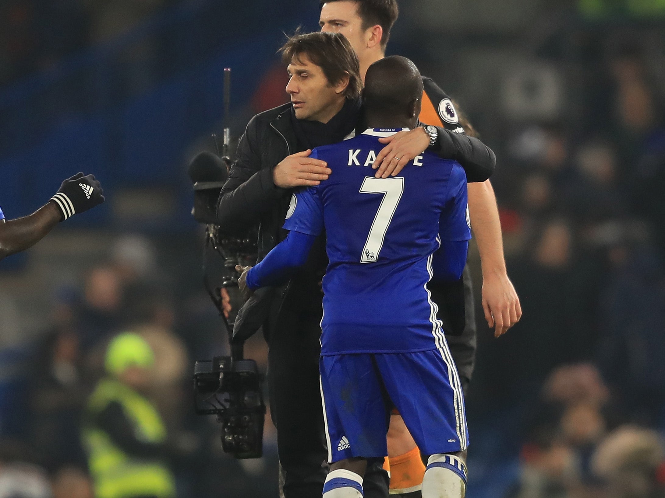 Kante and Conte embrace after another win, another step towards the title