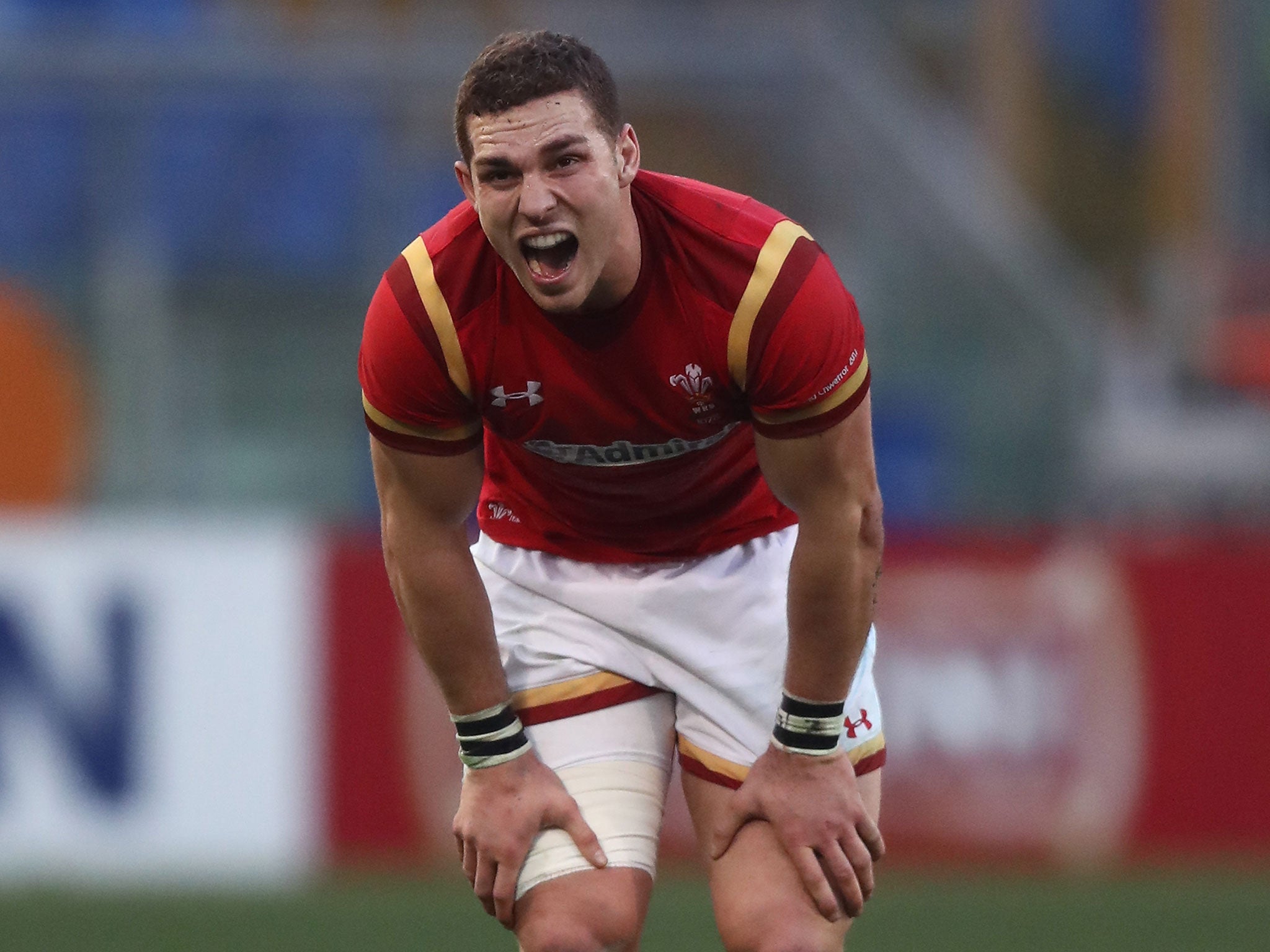 North recovers after his lung-busting run to score Wales's third try