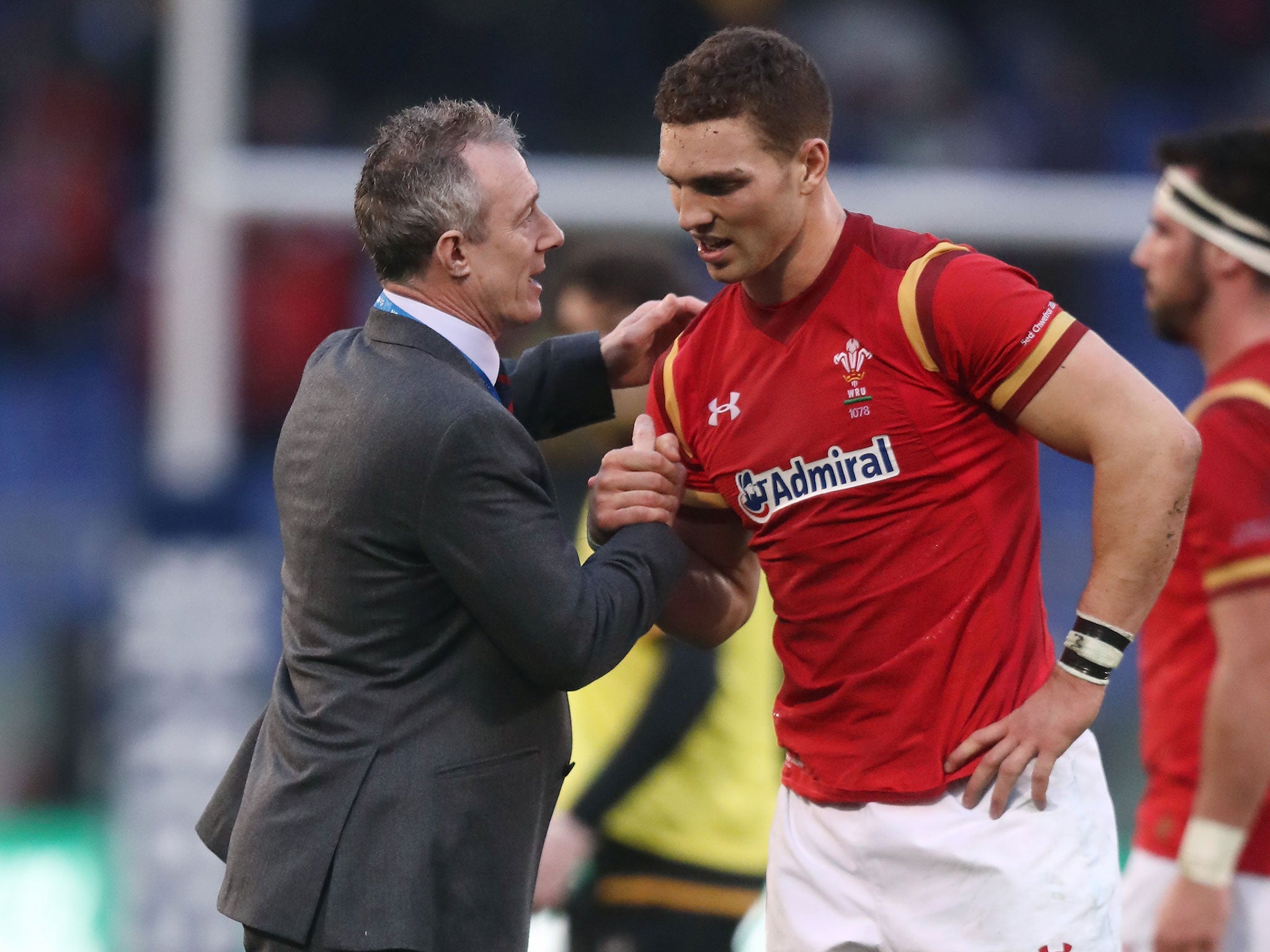 George North is congratulated by Rob Howley