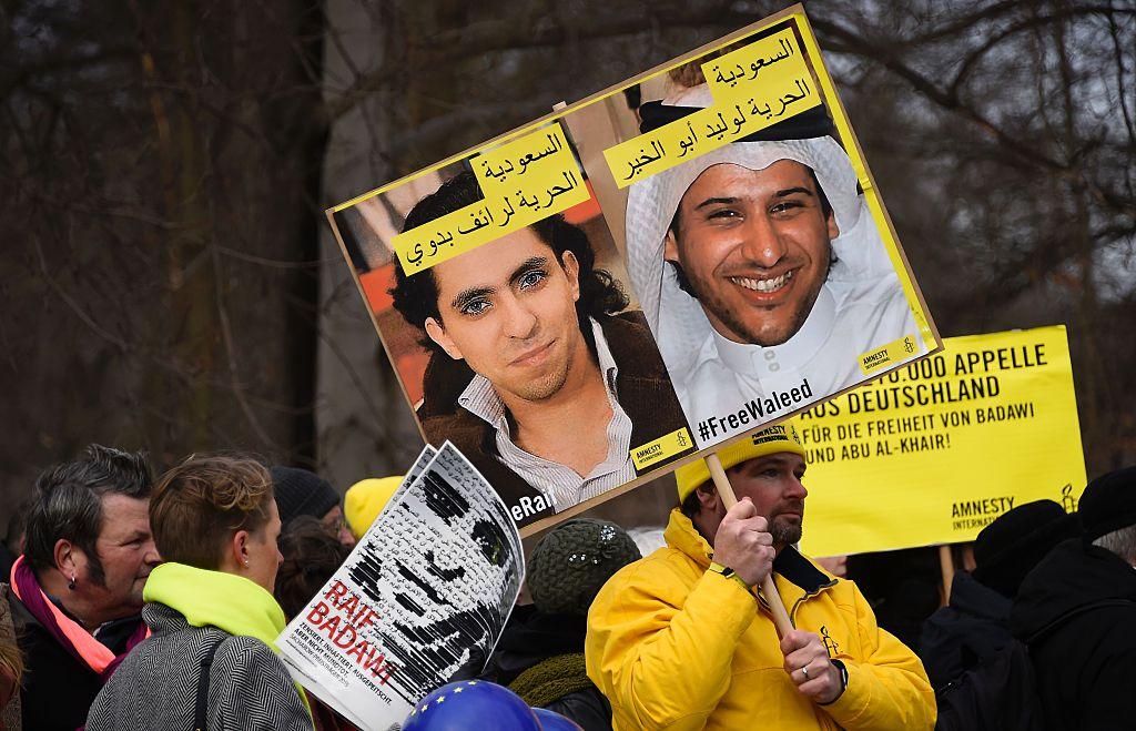 Demonstrators in Berlin protest outside Germany's Saudi Arabian embassy on January 8 2016 against the detention of Saudi blogger Raif Badawi and human rights activist and lawyer Waleed Abu Alkhair. Both men remain in prison and face lashes for charges re