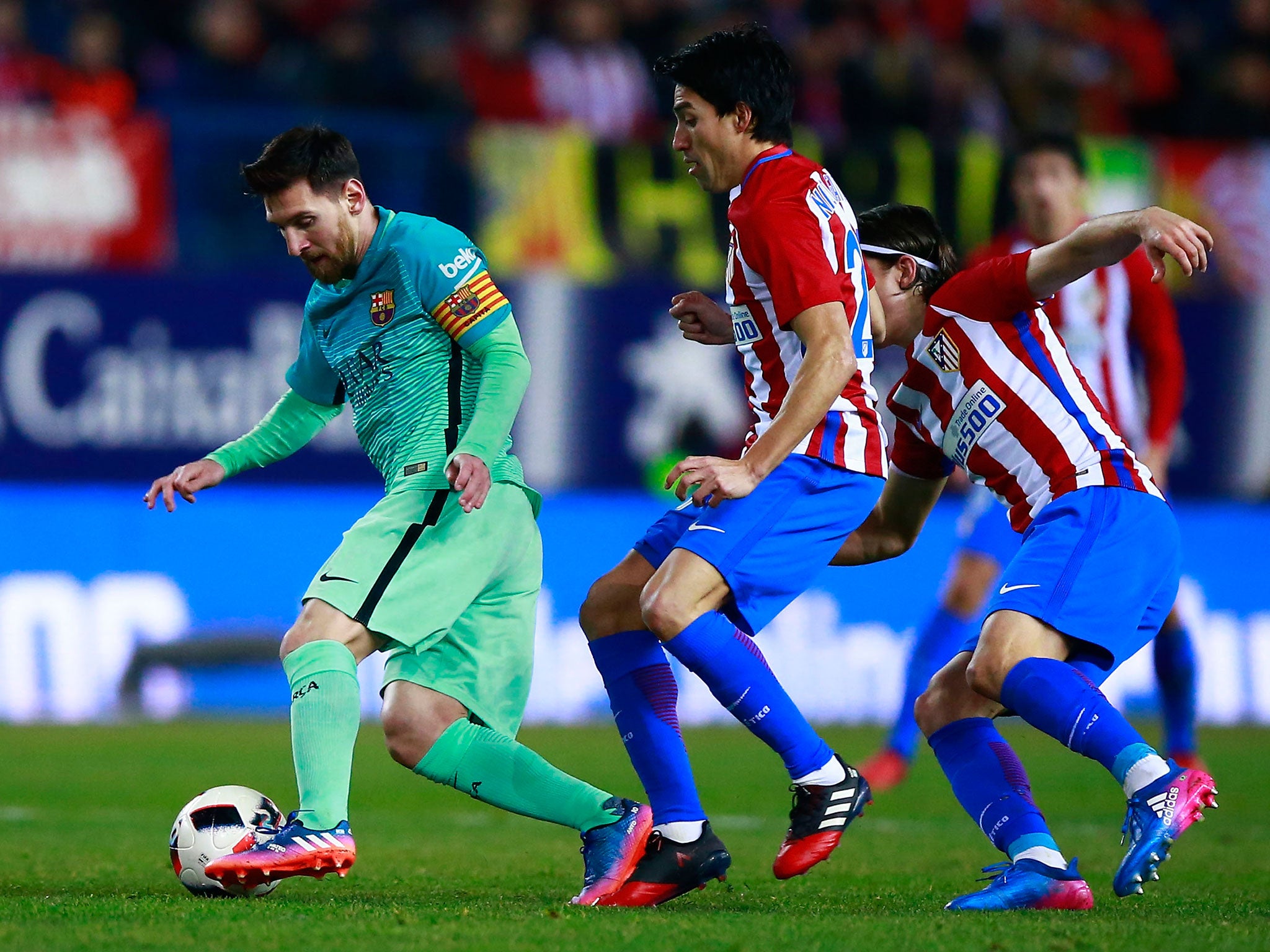 Lionel Messi in action for Barcelona against La Liga rivals Atletico Madrid