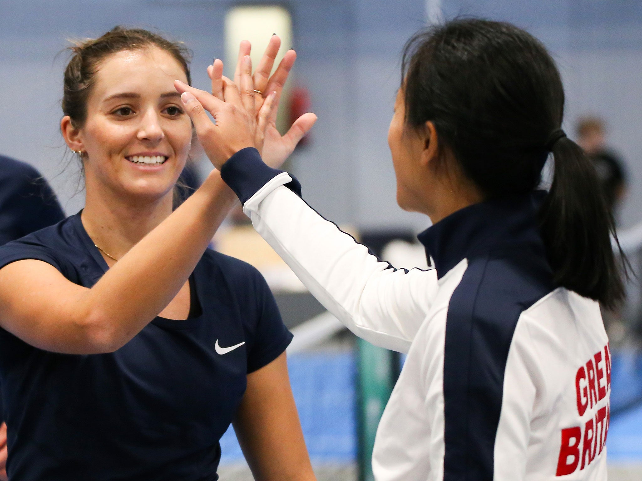 Laura Robson celebrates with Great Britain captain Anne Keothavong