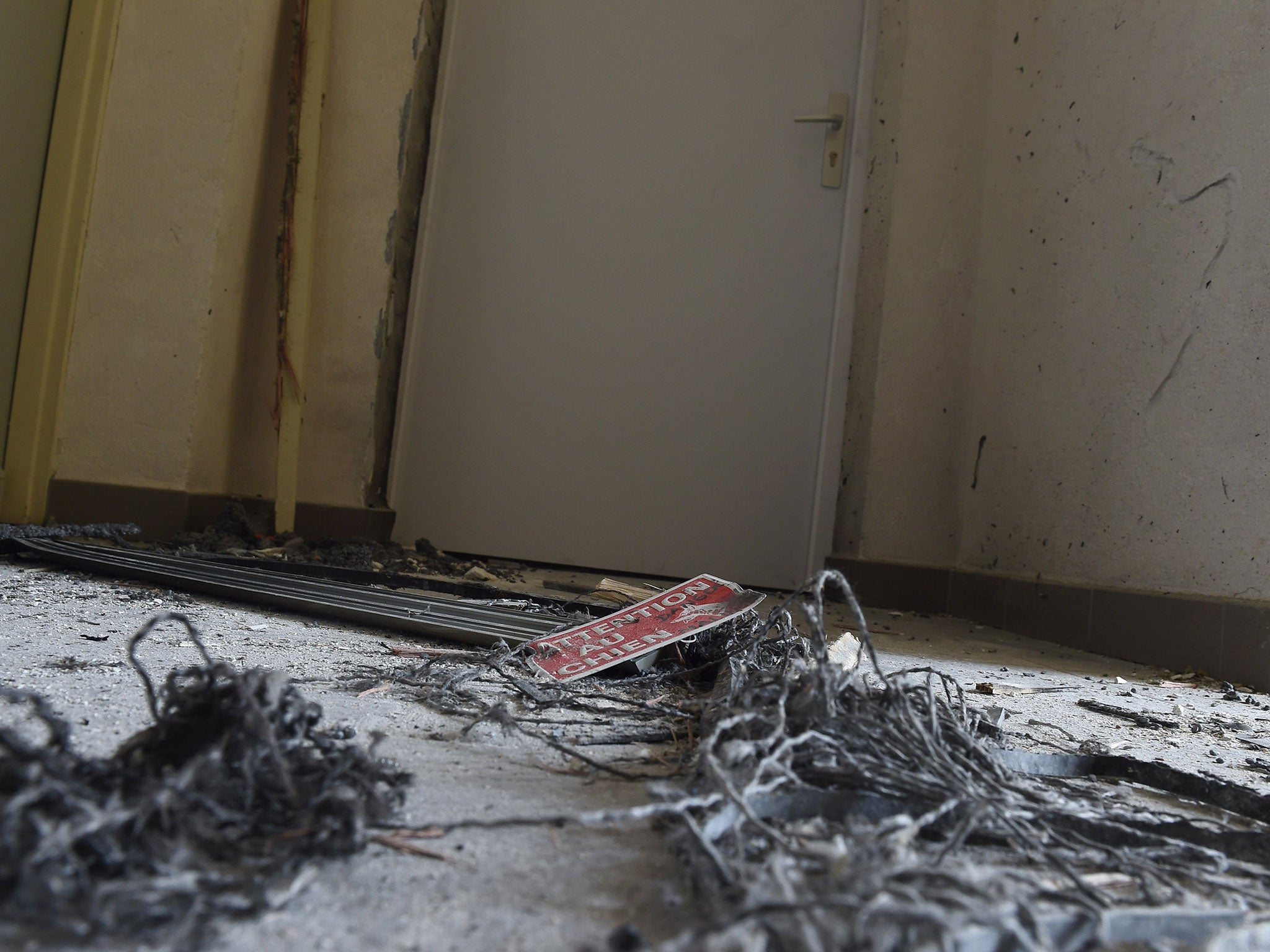 Debris of an explosion after French anti-terrorist police raided a flat, where suspects believed to be involved in plotting an attack were arrested, in Clapiers, near Montpellier, on 10 February