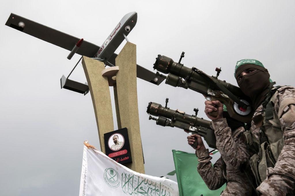 Members of the Ezz ad-Din al-Qassam Brigades, the military wing of the Palestinian Islamist movement Hamas, attend a memorial in the southern Gaza Strip town of Rafah on January 31, 2017